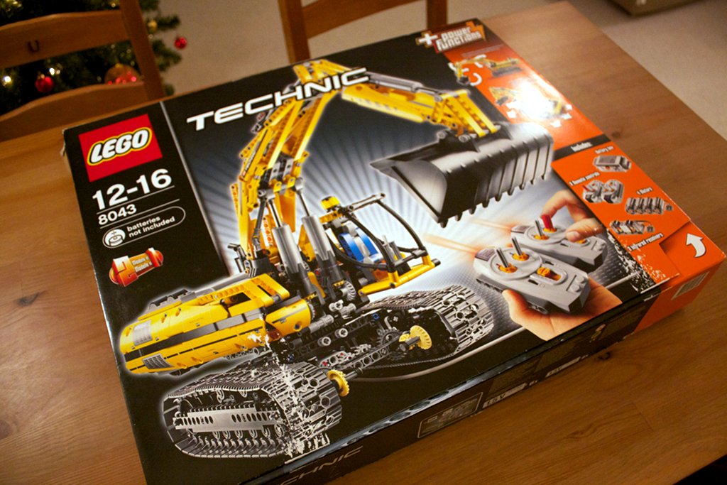 Lego 8043 excavator box placed on desk