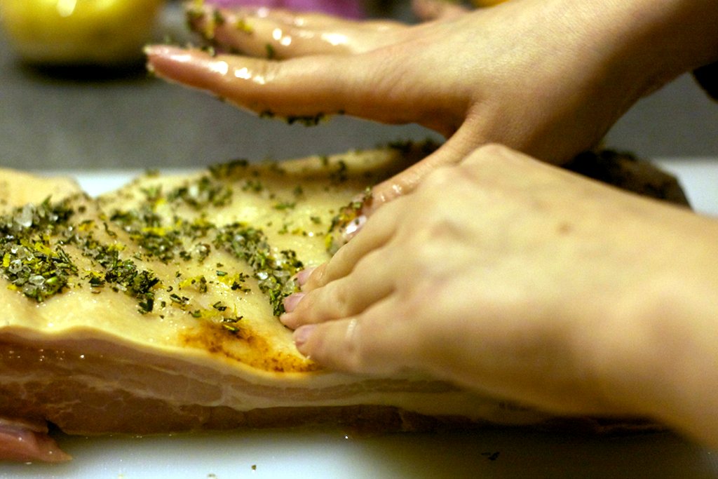 Pork belly with sunflower oil and herb mix added