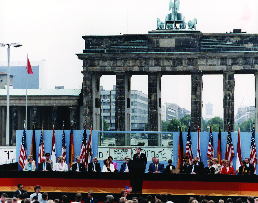 A photo of Ronald Reagan giving a speech in Berlin.