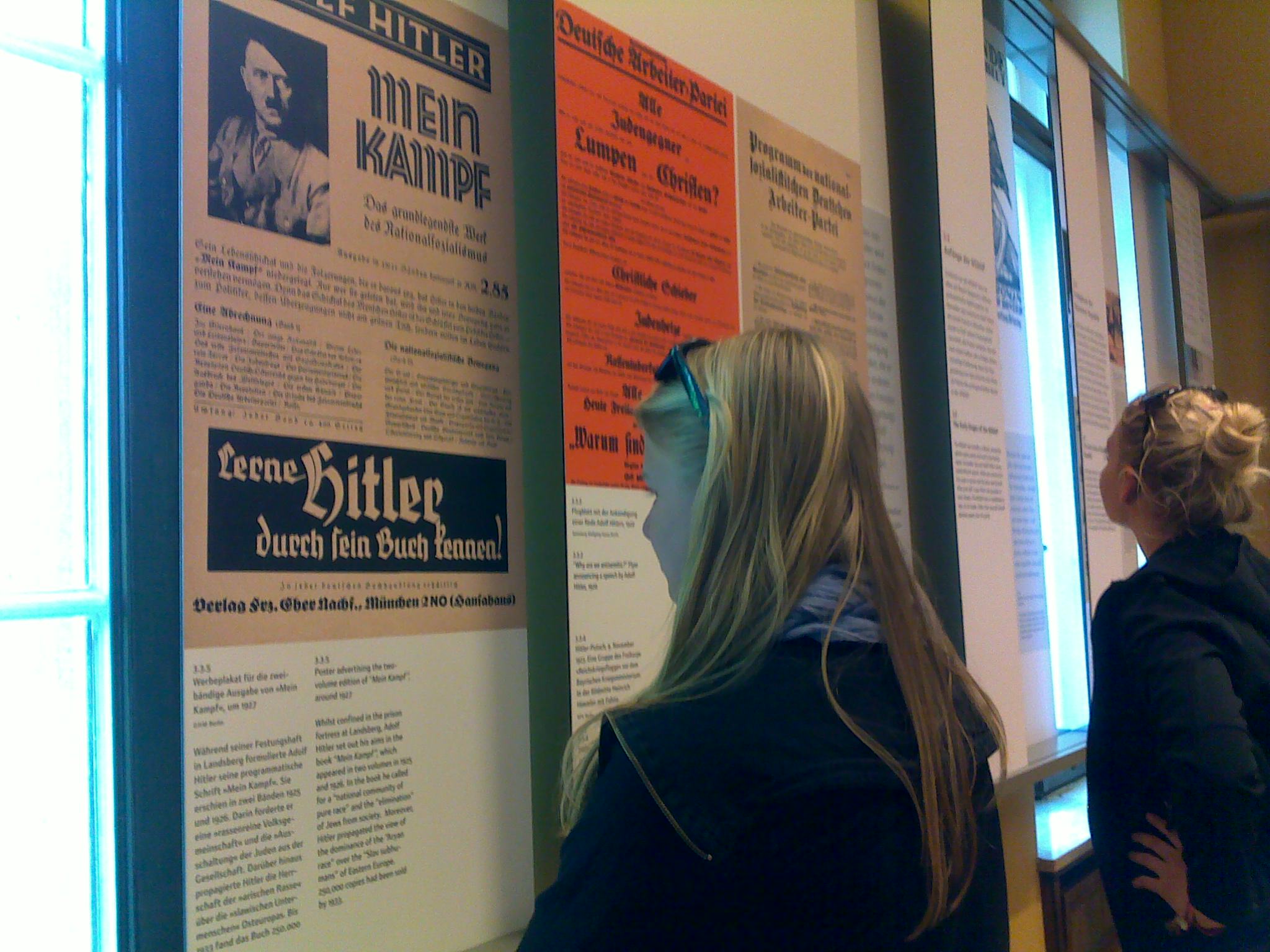 Students from the St. Ursula-Schule, a Catholic high school in Germany, view facsimiles of ads for Hitler's "Mein Kampf" at the House of the Wannsee Conference in Potsdam, site of the planning of the Final Solution. (Toby Axelrod)
