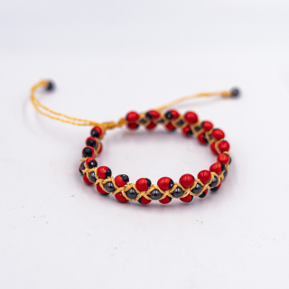 Pulsera Huayruro 3 filas (Huayruro bebe y imantando)