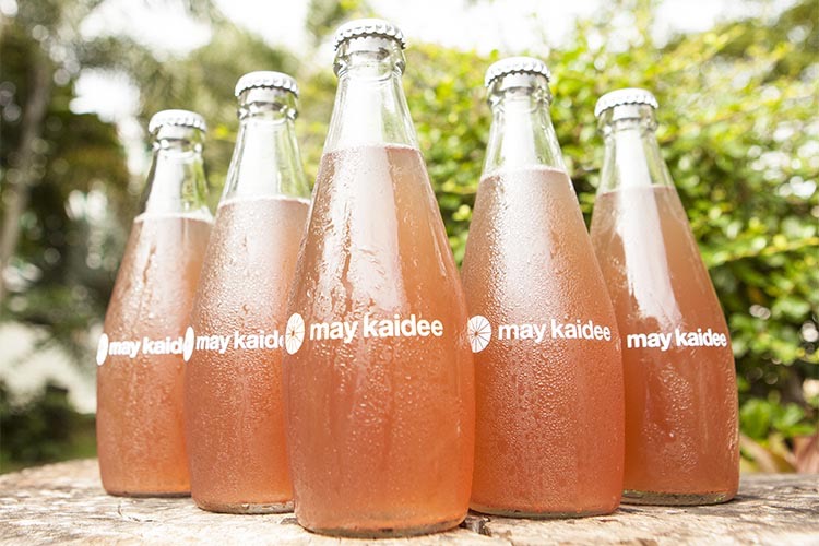 Bottles of ginger pomegranate tea, from our fresh juice and tea delivery in Bangkok and Chiang Mai.