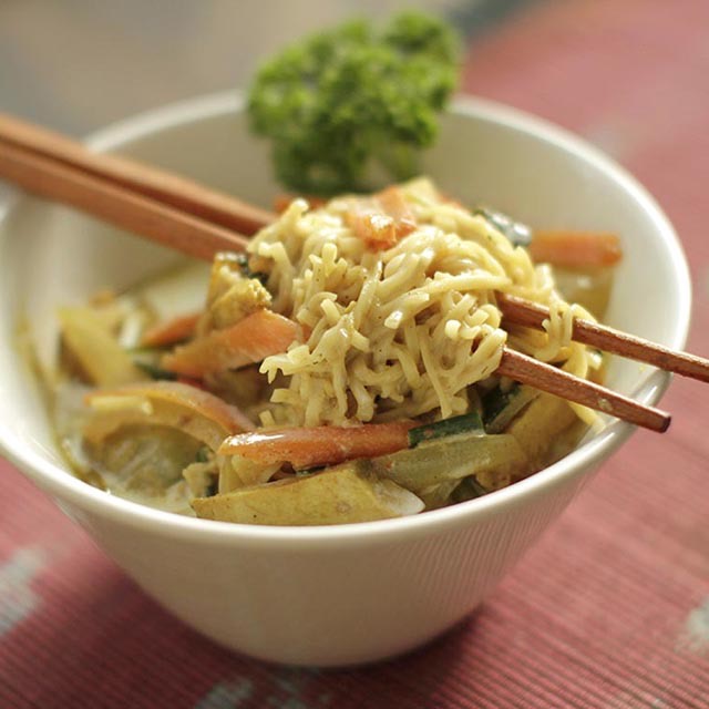 Bowl of Khao Soi, a popular noodle dish in Chiang Mai that we serve at our restaurant.