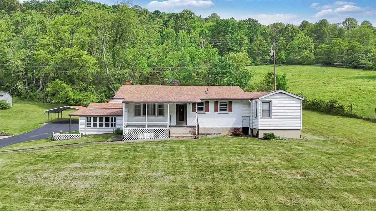 6715 Blacksburg RD - Photo 2