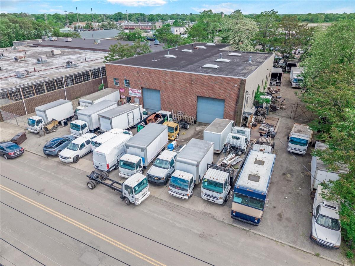 Great Open Warehouse With High 22 Foot Clear Ceiling Height. 2 Extra Large Overhead Doors In The Front Of The Building And One Extra Large Overhead Door In The Rear (14&rsquo;X14&rsquo; & 12&rsquo;X14&rsquo;). 400 Amps Power! Large Front Yard And Large Side Yard And Large Fenced In Lot In The Rear Of Building For Cars, Trucks, Or Storage. Property is .61 Acres! Tons of parking! 2 Private Offices As Well. Ideal Warehouse! 400 Amps Power!!!! So much outside storage and open airy warehouse space. There are drive-in doors in the front and rear of the warehouse, so you can drive through the warehouse if needed to get to the rear lot.