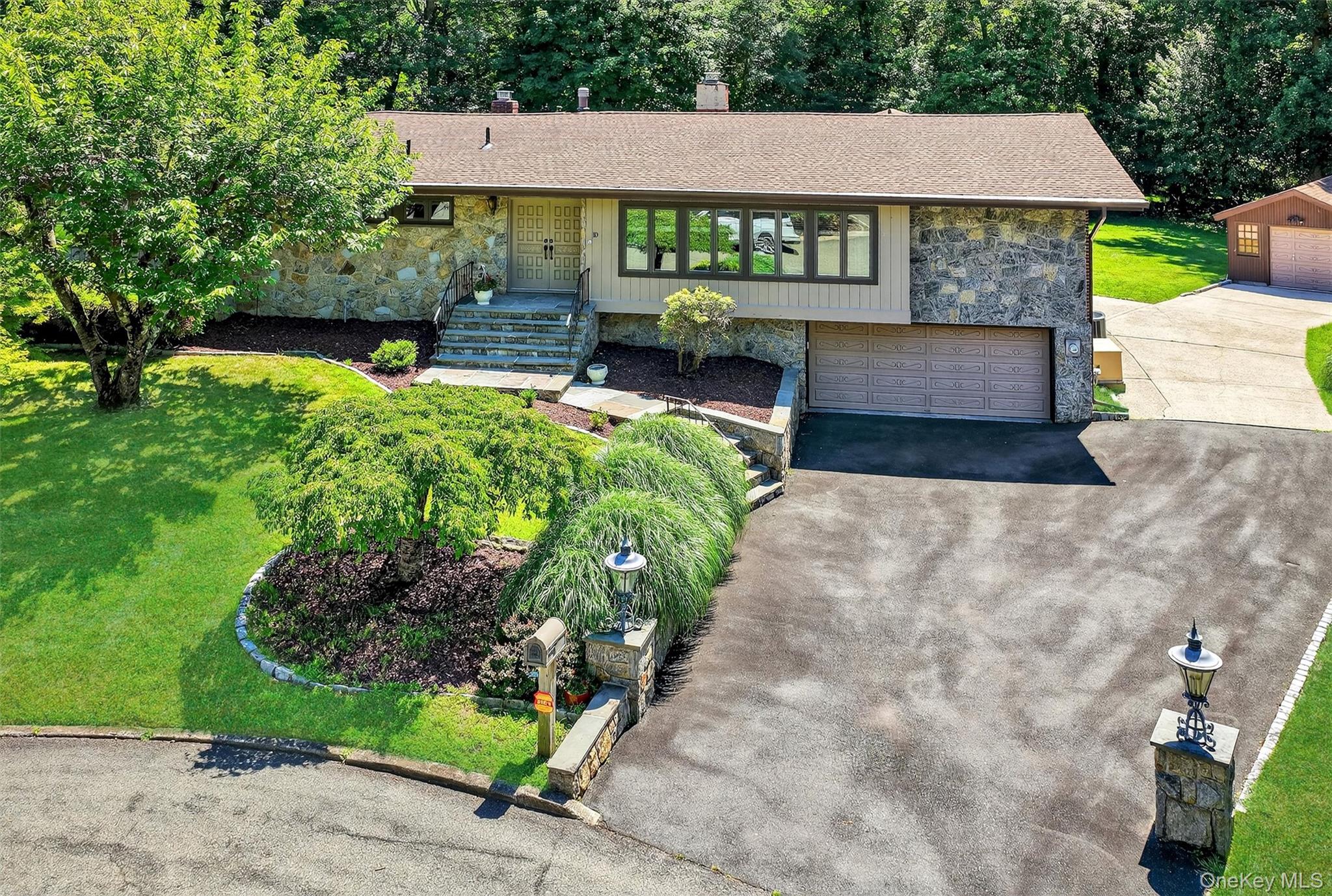 Welcome to the Cul-de-Sac! This exquisite all Brick & Stone Ranch with a sun-room is everything you have been looking for all nestled in a great location with a private backyard and In-ground pool. From the moment you arrive, the beautifully crafted stone front and walkway invites you inside to a bright and spacious foyer, setting the tone for the open and airy floor plan found throughout. Once inside you are flooded with natural light, where the expansive living room effortlessly transitions into a formal dining areaâ€”ideal for hosting dinner parties or enjoying intimate family meals. The spacious family room features vaulted ceiling, skylights that bathe the space in sunshine, and a striking stone fireplace, perfect for cozy evenings and creating lasting memories.The eat-in kitchen features: rich honey maple cabinetry, luxurious granite countertops, and abundant storageâ€”including a large pantry. The kitchen flows seamlessly into the stunning sunroom with vaulted ceilings & high end wood, offering breathtaking views of the private backyard oasis. Step outside to entertain or unwind on the stone patio while enjoying the serene sounds of your in-ground pool and lush landscapingâ€”a perfect retreat for summer gatherings or peaceful evenings under the stars. Plenty of room for the whole family with 4 bedrooms & 3 full bathrooms. Retreat to the generously sized primary bedroom complete with a full en-suite bathroom featuring elegant fixtures and finishes, creating a spa-like atmosphere. Three additional spacious bedrooms provide flexible space for family, guests, or a home office, plus an updated full bathroom with tasteful tile work and modern amenities.This home boasts gleaming hardwood floors and brand-new laminate flooring, newer high end windows, a newer roof, and a freshly painted interior that feels move-in ready. Solid hardwood doors. New pool filter. The expansive basement presents endless possibilitiesâ€”from a home theater, gym, or creative workspace, to additional living areas tailored to your lifestyle. Bonus features include a cedar closet for your seasonal storage needs, an attached two-car garage, plus a detached one-car garage, perfect for a workshop, studio, or extra storage.Situated in a very desirable area with access to top-rated schools, parks, shopping, and dining, this stunning ranch offers a rare combination of privacy, luxury, and convenience. Whether you&rsquo;re entertaining indoors or outdoors, relaxing in your sunroom, or hosting poolside parties, this home is designed to enhance every moment.Donâ€™t miss this unparalleled opportunity!