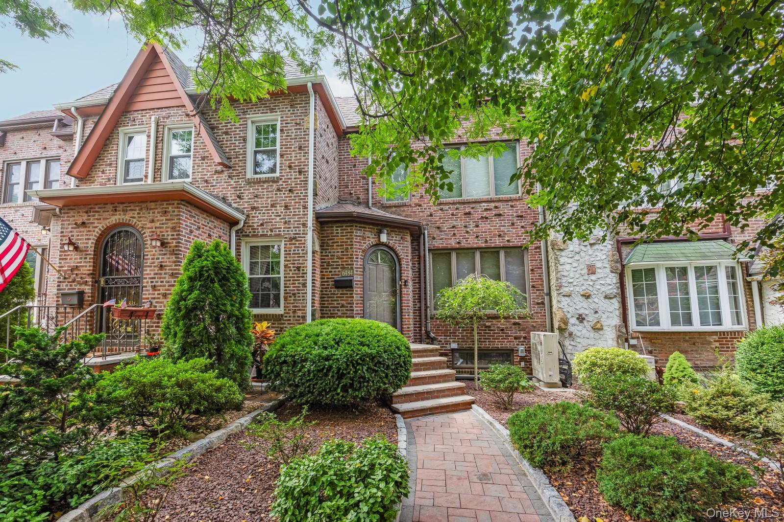Middle Village N: This well-maintained 1-family 20-foot brick Tudor-style home provides comfort and classic Middle Village charm. As you enter the home, youâ€™re greeted with an entrance foyer, a bright and airy living room, a formal dining room with double doors to your own private fenced-in yard, and a spacious eat-in kitchen with breakfast nook, featuring stainless steel appliances and abundant counter space. The second floor boasts three large bedrooms and a full bathroom with a jacuzzi tub and separate stall shower. Additional features include hardwood oak floors throughout, split system ACs, 3 zone gas hot water heating, a full finished basement with half bath, â€œhome runâ€ electrical wiring providing consistent power to all major appliances straight from your main electrical panel, and a community driveway and detached 1-car garage for convenient parking. Garbage pick-up is a breeze, as trash/recycling collection is in the rear. Zoned for the highly regarded PS/IS 49 and Forest Hills High School. This property provides the peacefulness of a residential area while still having easy access to the amenities and entertainment options of the city. Conveniently located near the scenic Juniper Valley Park as well as public transportation options on Eliot Avenue including the local Q38 bus line and QM24, QM25, and QM34 express bus lines to Manhattan.
