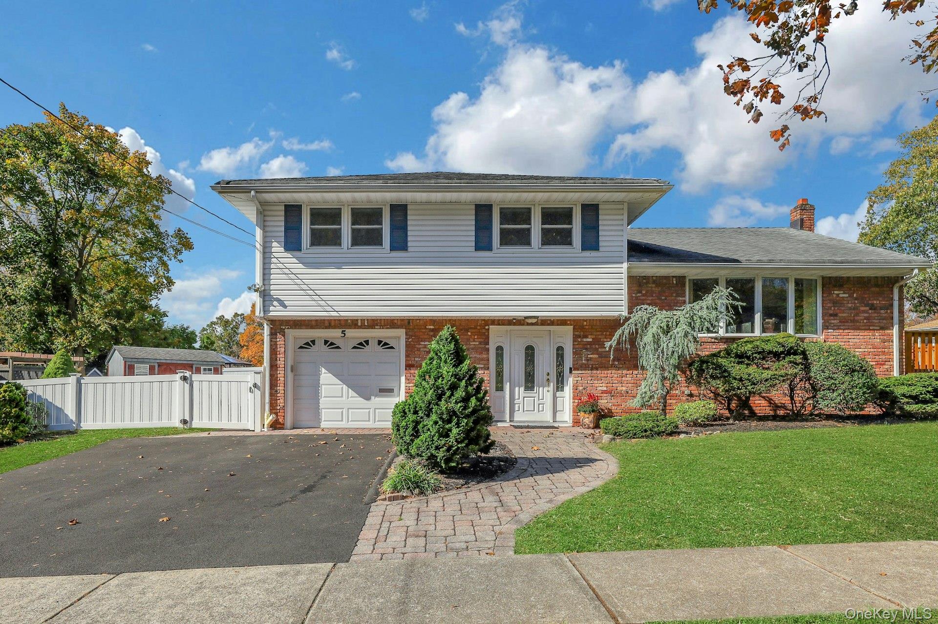 Welcome to 5 Forest Knoll Drive! Tucked on a quiet street in the Village of Suffern, this warm and inviting home has been lovingly maintained and offers wonderful space to live and gather. With beautiful curb appeal, mature plantings, and clear pride of ownership, the setting feels instantly welcoming. The entry level features a bright family roomâ€”perfect for movie nights or relaxingâ€”and a full bath for convenience. Upstairs, the main living area opens to a light-filled living room, dining area, and kitchen with an easy flow. Sliding doors lead to a spacious deck overlooking the backyardâ€”ideal for morning coffee, barbecues, or simply enjoying the peaceful surroundings. Three bedrooms share a full bath with access from both the hall and primary bedroom, and a partially finished basement provides flexible space. With an attached garage, 7, 400+ sq ft lot, and easy Manhattan access, this home blends comfort, care, and connection.