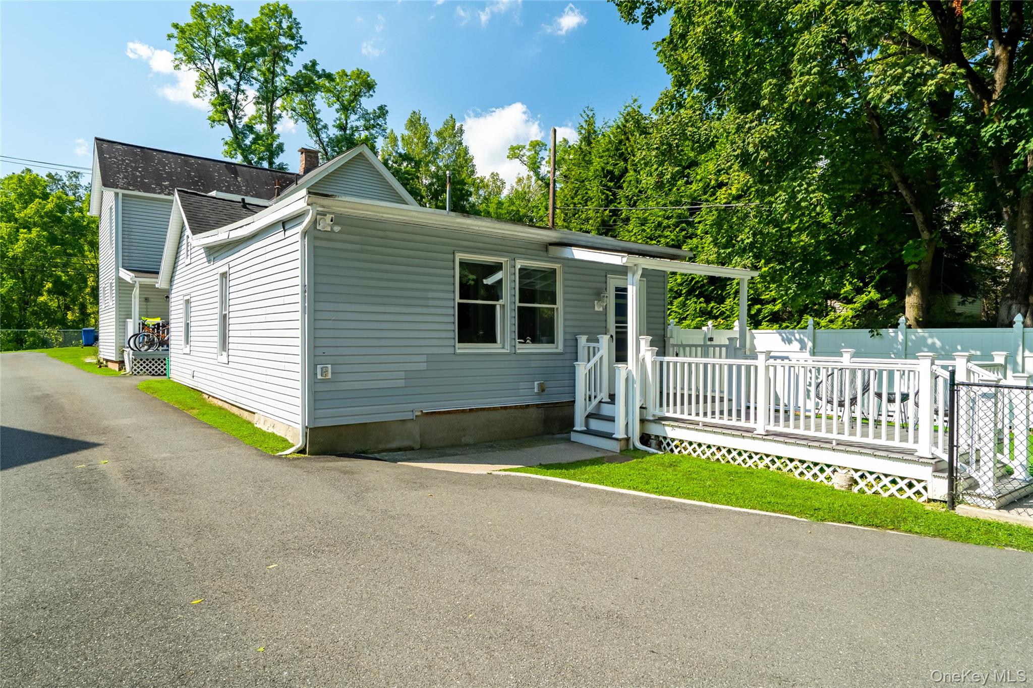Renovated and move-in ready, this one-bedroom, one-bathroom cottage offers privacy, comfort, and style. Enjoy the peace of renting a standalone home with no tenants above or below you. The property includes a trex deck, fenced-in yard, a long driveway with a carport, and a shed available for tenant use.Inside, the stunning modern kitchen features blue cabinetry, quartz countertops, stainless steel appliances and a stylish backsplash. The spacious primary bedroom offers two closets, including a walk-in, while the luxurious bathroom includes a rainfall shower and soaking tub. The living room, with its high ceilings, is perfect for both relaxing and entertaining. Additional conveniences include in-unit washer and dryer, and a ductless A/C split with heat.The landlord provides snow removal, garbage, and lawn maintenance, while the tenant is responsible for utilities. A minimum credit score of 650 is required.