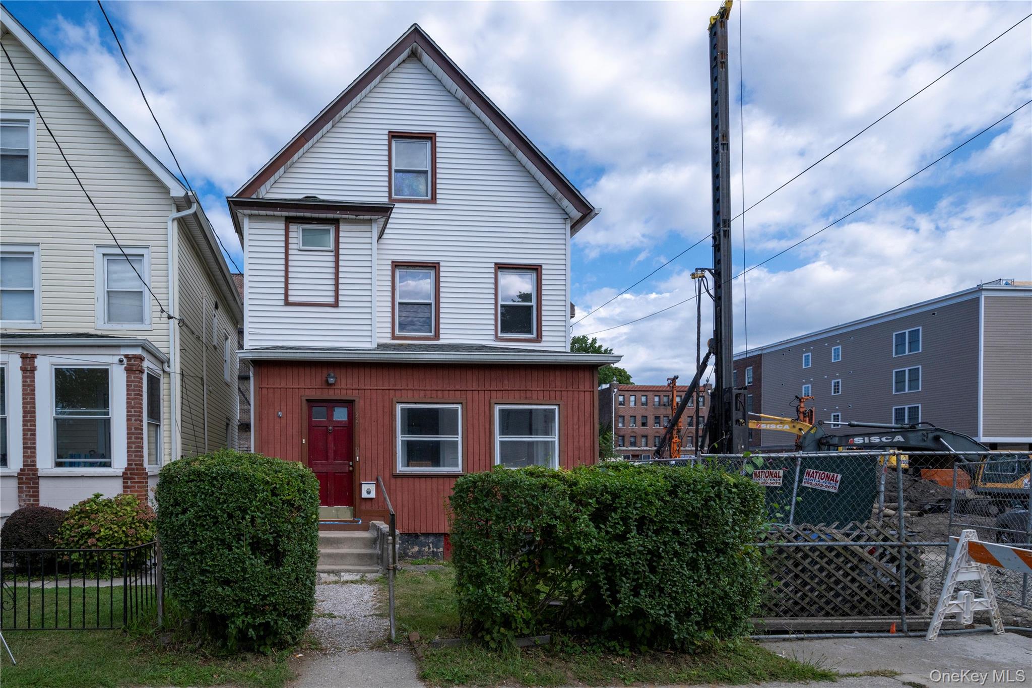 The Perfect Downtown Location! A Legal 2-Family just a few steps from the New Hutchinson Elementary School, Beautiful Downtown Pelham Village, Shops, Restaurants, Banks, Metro North RR Station. First Floor Apartment is rented and yields over $20, 000 a year in rental income. This amount will more than cover your taxes and much, much more! The downtown landscape is developing, and this house is next to what will be a fabulous luxury building once completed. For right now, your imagination is needed. This is Pelham&rsquo;s most affordable house and the only multi-family house listed as of Sept 3rd.
