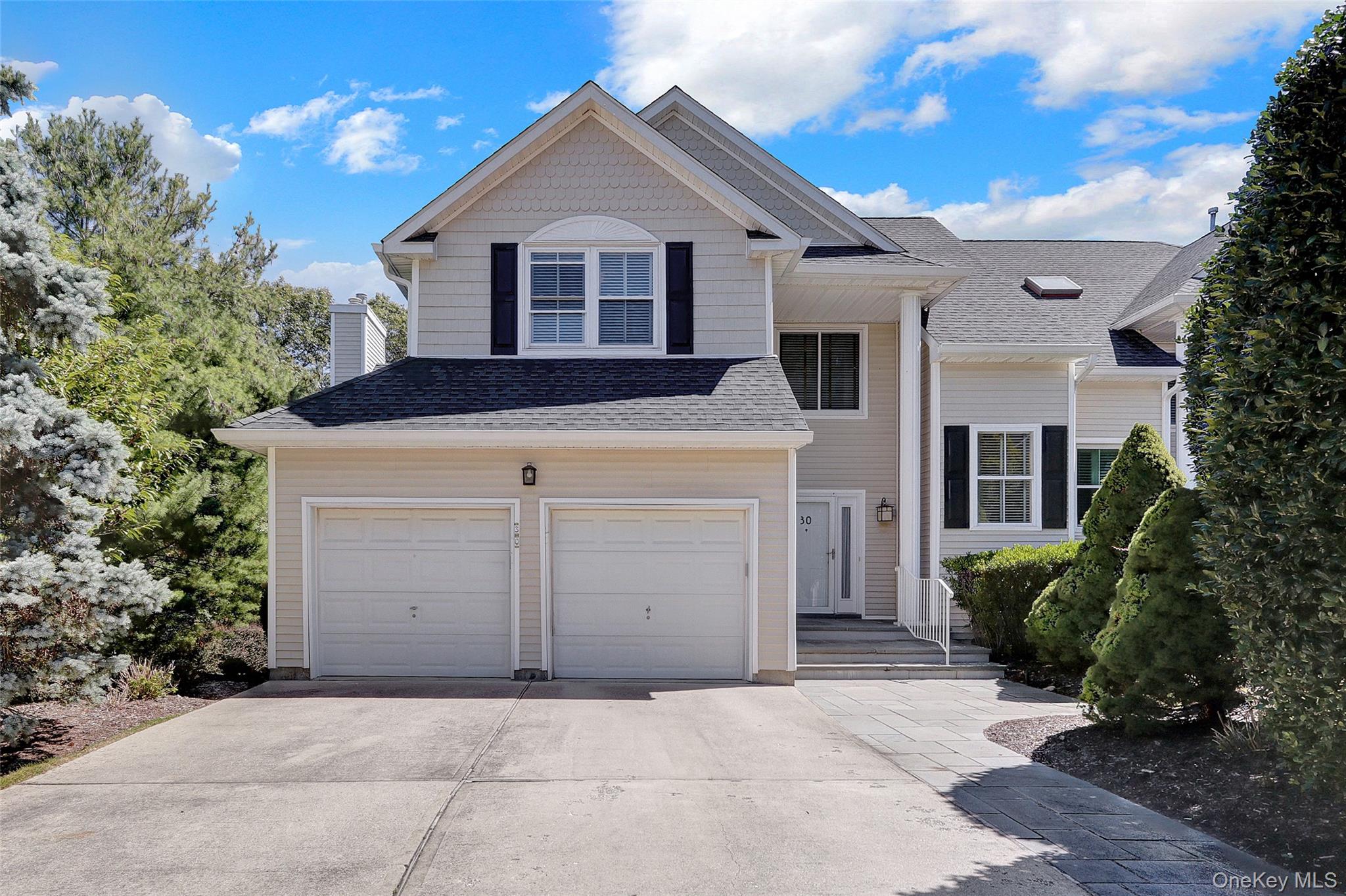 Beautiful sundrenched Townhouse in cul-de-sac of Harbor View Gated Community, Port Jefferson Village. 3 levels of living; First floor features easy 2 step entry into foyer with double coat closet/pantry, 1/2 bath, new kitchen with white cabinets/ granite counter tops, new appliances, high hat lighting; Livingroom features a gas fireplace, vaulted ceiling and lots of windows; Dining room is open to living room and kitchen with sliding French doors onto a deck with privacy for dining and leisure. 2nd level has Primary bedroom with full bath/stand up shower/spa bath tub, 2 double California Closets; 2 additional bedroom (1 with water view) and hall bath, washer/dryer hookup in walk in hall closet; oversized 2 car garage with additional storage; washer and dryer in full finished lower walk out level with full bath, Smart Thermostat, Ring Camera, tankless water heater, Community salt water outdoor pool, gym and tennis court, Port Jefferson Village amenities including, 2 private resident only beaches, free parking, tennis courts, Golf & Country Club access & events. Enjoy the vibrant Port Jeff Community & Culture with live theater at Theater Three, Port Jefferson Arts Council sponsored year round concerts, art exhibits, Farmers Market, special events throughout the year including Dickens, Sea Shanty, Ice & Culper Spy Festivals, library, historic East Main Street. Ferry to Bridgeport CT, LIRR to NYC, 2 hospitals and close access to SUNY Stony Brook.