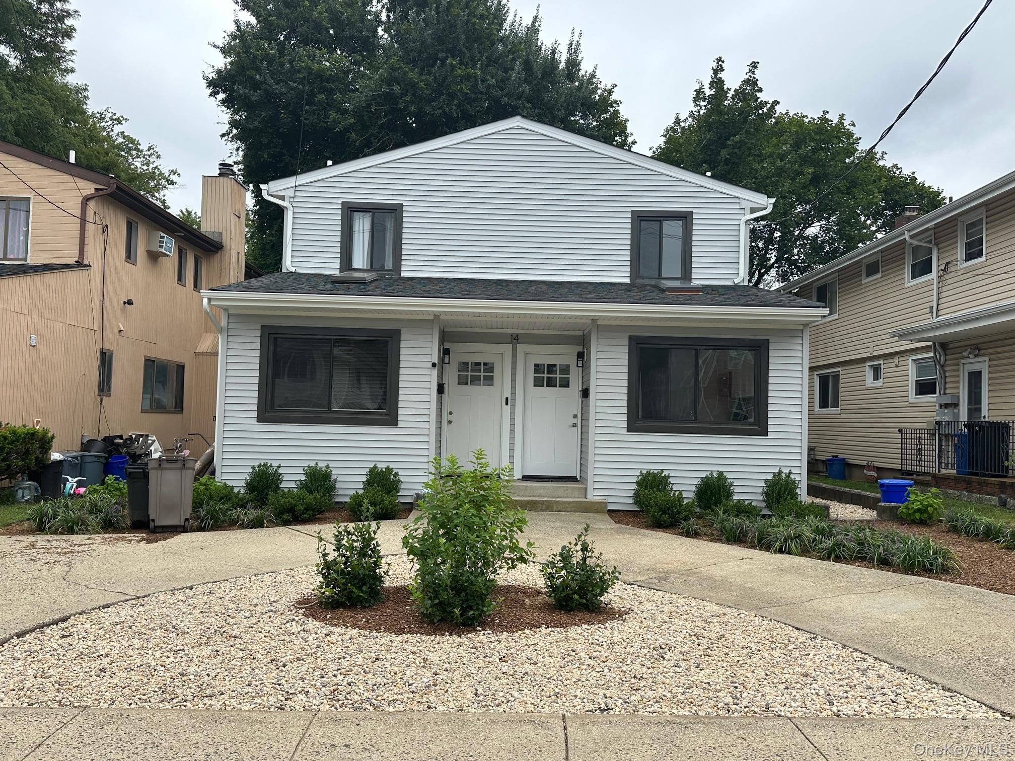 Totally Renovated 2 Bedrm, 2.5 Bath Duplex On A Quiet Street. All New Kitchen With Stainless Steel Appliances. Living Room W/Fpl, Dining Area, Hardwood Floors Throughout. Bedroom W/Cathedral Ceiling, Skylight, Deck. Off Street Parking.