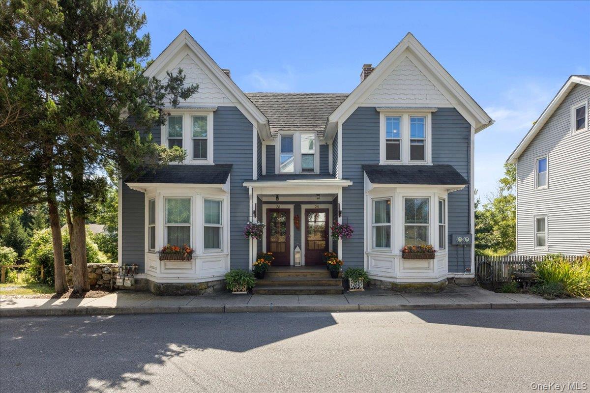 A tremendous opportunity to own a well-maintained duplex in the heart of the village of Warwick. This property is situated in a choice location with close proximity to all of the amenities Warwick has to offer. Each tri-story unit has been updated throughout the years while also maintaining the historical charm of a period home. Both units feature original gleaming hardwood floors throughout the main and second levels as well as upper level and lower-level rear decks. They also provide a kitchen and living room on the main level along with two bedrooms and full bath on the second level as well as a bonus room on the lower level with an additional full bath and walk-out to the rear yard. The lower level of each unit also provides additional storage space and a washer/dryer. The kitchens of each unit are well appointed with ample storage, stainless steel appliances, and dining area. On the second level, the bedrooms each provide their own unique views with the front bedrooms looking out towards Lewis Park and the rear providing a view of the yard. Upon taking a tour, you will notice the numerous upgrades throughout including lighting, central AC, updated bathrooms and so much more. Truly a gem of a home in a most desirable location with off street parking, walking distance to shops, restaurants, schools, bus stop, parks and library. Options to add this to a growing portfolio, live in one side and rent the other or a short-term rental investment.