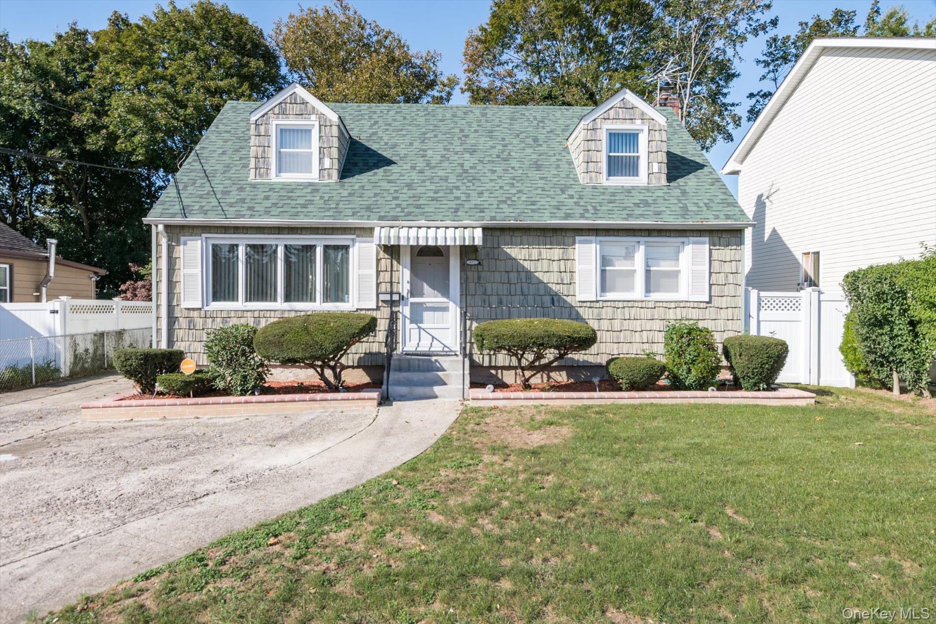 Welcome to this beautifully home in the Heart of Uniondale 4-bedroom, 3-bathroom Cape offering comfort, space, and style. Step into the living room and formal dining room with hardwood floors that flow throughout, creating an inviting and elegant atmosphere. The home also features a finished basement, perfect for additional living space, a home office, or entertaining.Outside, enjoy a large backyard ideal for relaxing, gardening, or hosting gatherings, plus the convenience of a 1-car garage.This home truly has what you&rsquo;re looking forâ€”space and location. Donâ€™t wait â€” this one wonâ€™t last!