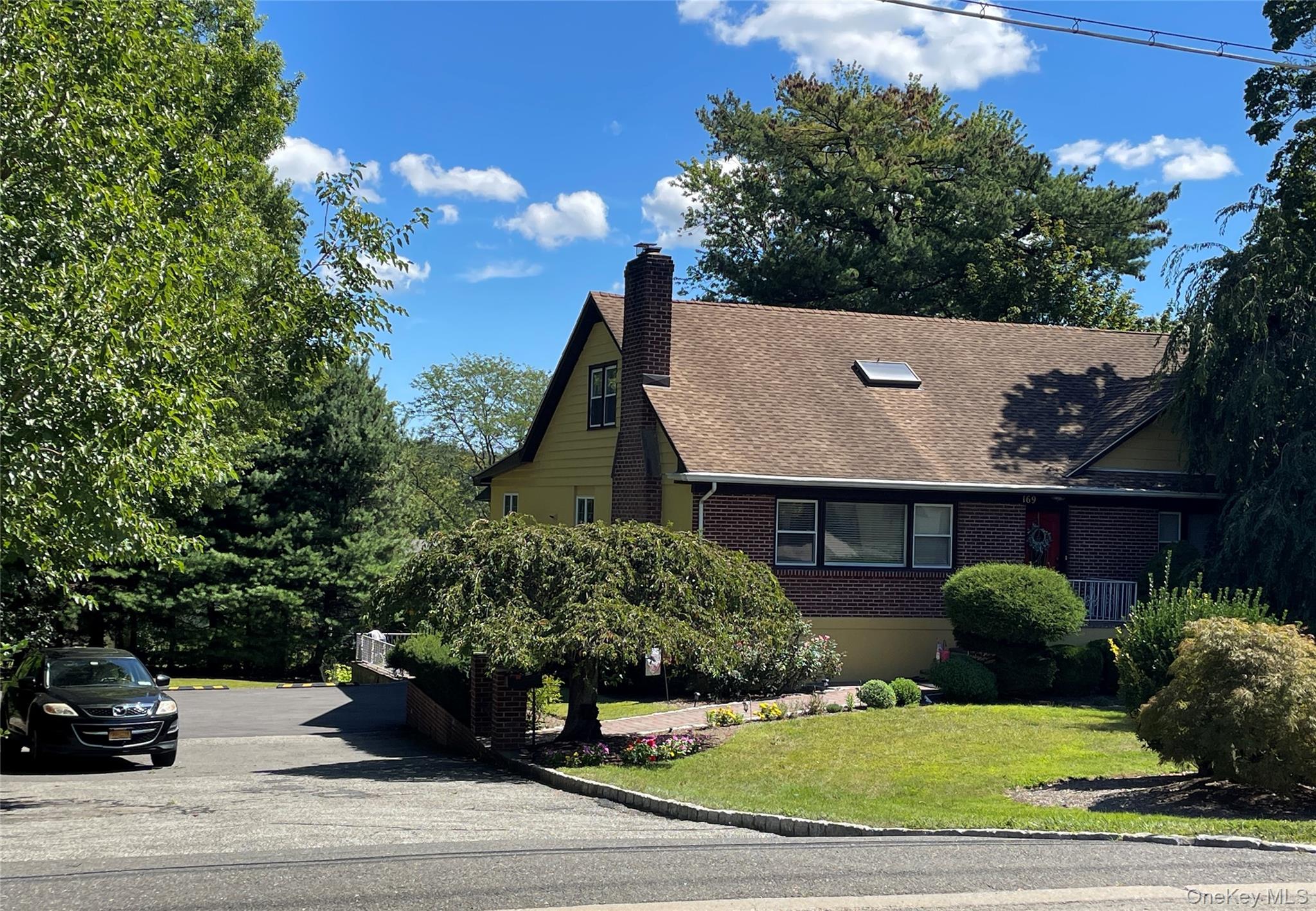 Welcome home to this sunny & spacious updated 2nd floor Apartment located in the heart of the Highlands in White Plains. Beautiful landscapes and large back yard for enjoyment. Recent upgrades include new kitchen cabinets, flooring,  Quarts countertop and ductless AC/ heat split units in every room. New Washer/ Dryer in the unit.  Close to downtown Shopping, restaurants,  schools, buses, Metro-North Train Station 37 mins to GCS in NYC.  The apartment is spotless.  This apartment can be rented furnished or unfurnished. No Pets.One assigned driveway parking spot included. $200 monthly fee for All utilities ( electric/ heat/ hot water/ Cooling).