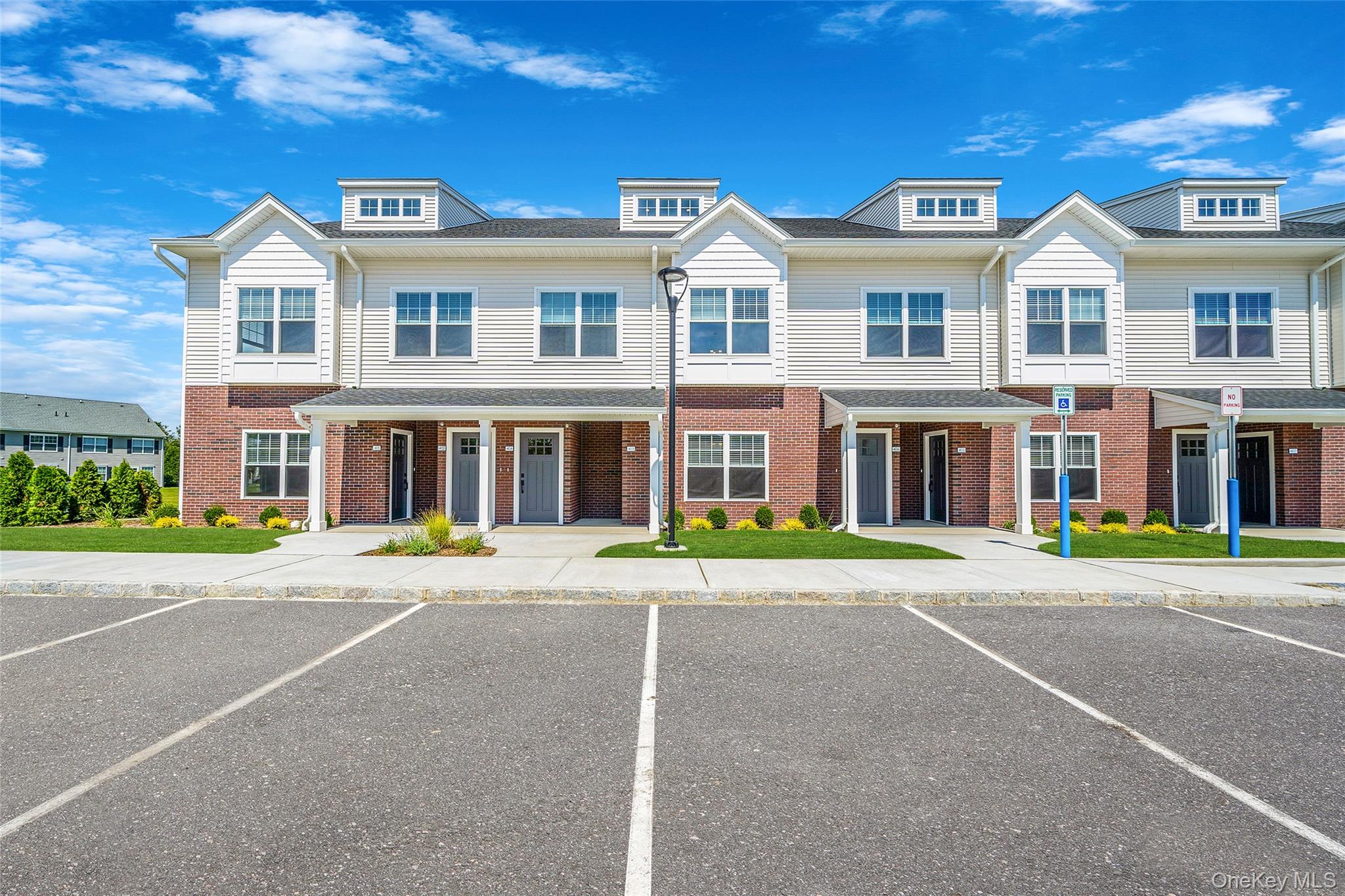 BRAND NEW LUXURY RENTAL COMMUNITY!!! Be the first to live in this premier gated community. Units include modern design with high-end finishes; quartz countertops, porcelain tiles, 9&rsquo; ceilings, oversized great room with open two story ceiling heights (in upper units), coat closet plus storage closet, in-unit laundry, private patio/balcony. Both bedrooms include a walk-in-closet, while the master bedroom also includes a full ensuite bathroom with shower stall, finished with Calcutta porcelain and Delta fixtures. The entire community has access to both Verizon and Optimum internet. AMENITIES Amenities will include club house (private events, gym, conference room, billiards room), outdoor deck, outdoor heated saltwater swimming pool, dedicated dog walks. Located mid-island with proximity to restaurants, shopping, Touro University, Cohalan Courthouse Complex, Suffolk Country 10th District Court, US District Court, East District Court and to the LIE and Southern State Parkway. Fees: Application $20 / Pet Administration Fee: $250 / Monthly Pet Fee$50/mo. SPECIAL PROMOTIONS (additional criteria apply): 1) Security Deposit of $99 for minimum credit score 2) First Responders: 10% rent discount 3) Touro Law Student: 1 month free rent (if sign 13 month lease) 4) Two months free for eligible applicants who sign a 26-month lease.