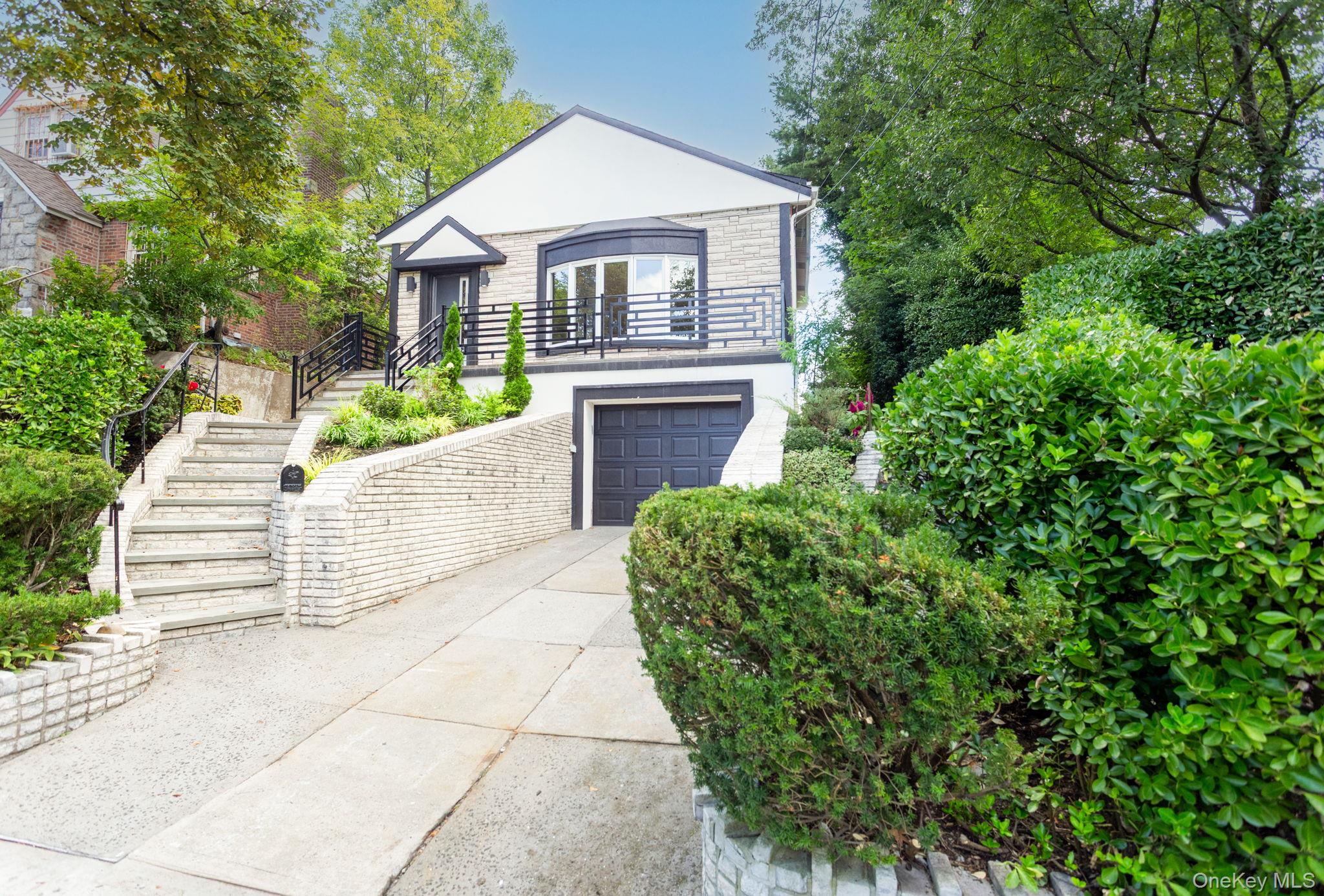 Welcome to this beautifully classic and modern appointed 4-bedroom, 4 full bathroom, Split-level home offering timeless architecture with luxurious modern upgrades. Step inside to view cathedral ceilings and a thoughtfully designed open floor plan that creates a bright, expansive atmosphereâ€”perfect for both everyday living and entertaining.The heart of the home is the chefâ€™s custom kitchen with French doors to a patio for alfresco dining, featuring sleek Quartz countertops with premium stainless-steel Thermador appliances and ample cabinetry. The large island offers great conversation space that seamlessly flows into the dining and living room. Gather around the cozy fireplace in the spacious family room that leads out to another patioâ€”ideal for relaxing and overlooking the spacious backyard.Additional highlights include a mud room/laundry room with modern conveniences, a tranquil patio, and a 2-car tandem garage.Located just minutes from public transit, schools, and popular shops, this home offers the perfect combination of style, space, and convenience.Experience the epitome of modern and gracious living in this stunning home.
