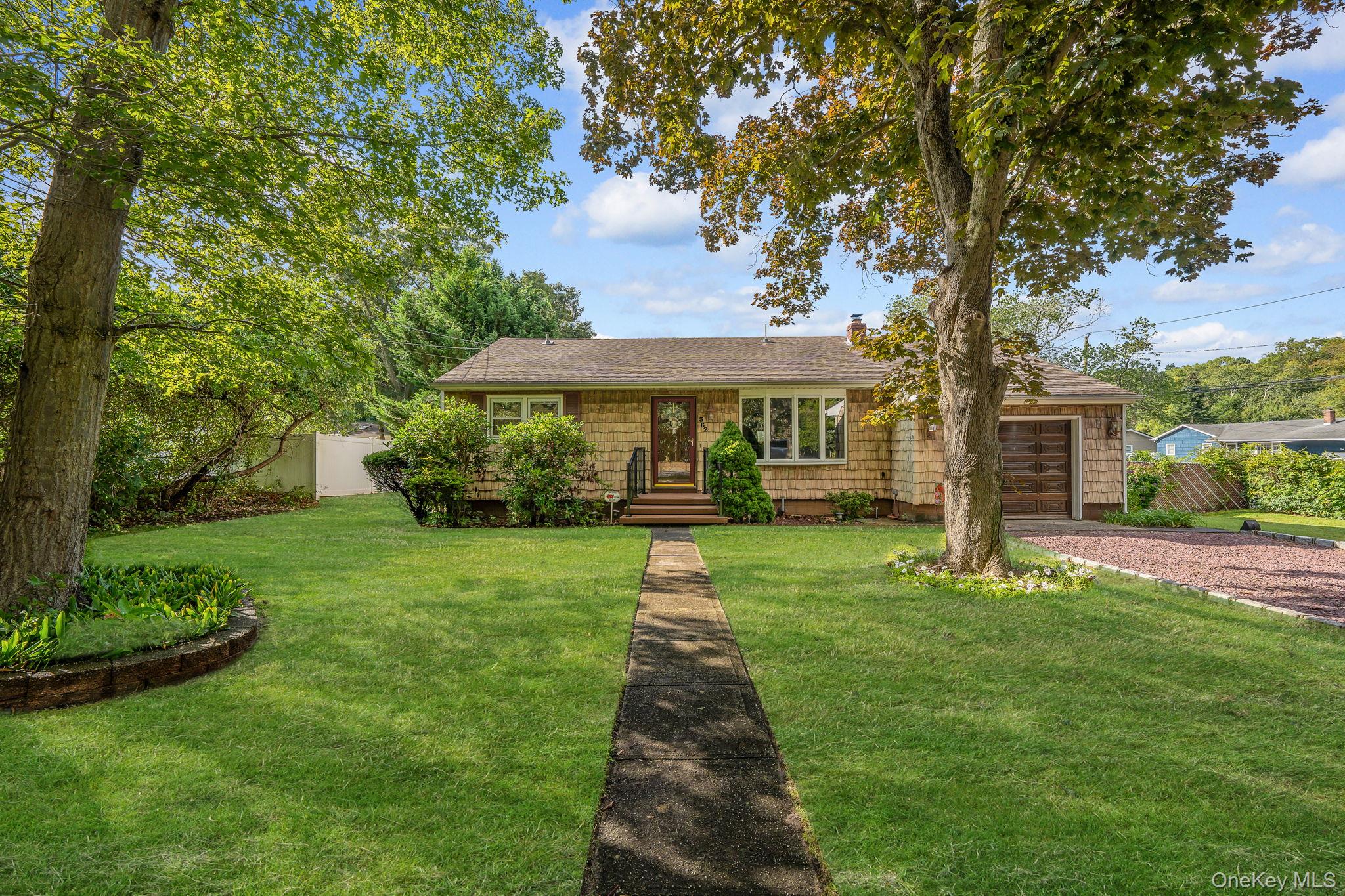 Welcome to 362 W Woodside Ave, Patchogue â€” a charming 3-bedroom, 1-bath ranch lovingly maintained by its original owner since 1960. This home offers timeless character with hardwood floors throughout, and plenty of potential to make it your own. Features include updated vinyl windows, a full basement for storage or additional living space, 1-year-old oil tank and a 1.5 attached garage. The home is equipped with updated cesspools and a newer bluestone front porch. Step outside, and enjoy your fully fenced yard and 6-zone ig sprinklers. Perfectly situated on a corner lot in Patchogue, this property is ready for its next chapter!