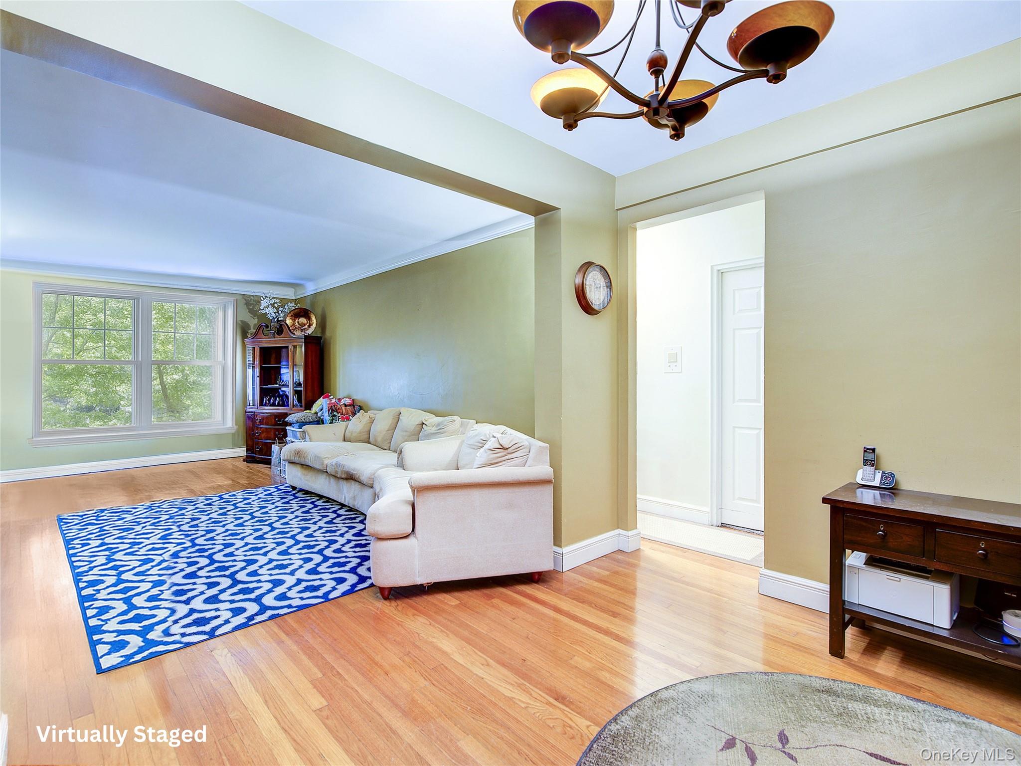 1000 square feet 2 bedroom for only $325k in a prime Kew Gardens location!Bright and move in ready top floor 2 bedroom jewel at a highly sought after Roger Williams Co-Op!Unit features naturally bright bedrooms, an oversized living room with eastern exposure, hardwood floors, high ceilings, and an inviting open layout. The large living room overlooks lush greenery outside the building and offers an abundance space for both dining and entertaining.The King-Sized primary bedroom features dual exposures of greenery, and is large enough to also allow for a work from home space if one needs.The second bedroom is Queen sized with multiple windows allowing for an abundance of light.The windowed kitchen offers granite countertops and ample countertop and cabinet space for your dishes.Building amenities include newly upgraded elevators, a part time doorman (6 days a week), a live-in super, on-site laundry and parking (waitlisted), a community room, bike room, storage rooms, and a private playground and courtyard for residents.You canâ€™t ask for a better location in central Queens; within blocks of coffee shops, restaurants, a supermarket, a movie theater, and a zoned elementary school (PS 99). The Roger Williams Co-op is also 2 blocks from the Kew Gardens LIRR station which offers 15-minute train rides to both Grand Central and Penn Station while also being 7 blocks to the E and F trains. After a day in Manhattan, thereâ€™s nothing better than experiencing nature and this building is just 5 mins from Forest Park with 500+ acres to enjoy incredible trails, a running track, dog park, tennis, and golf. This incredibly desirable location is also just 10 minutes from the bustling action of Austin Street in Forrest Hills and equally close to the world famous Corona Park where you can experience a Mets game, the US Open, or the Queens Night Market.