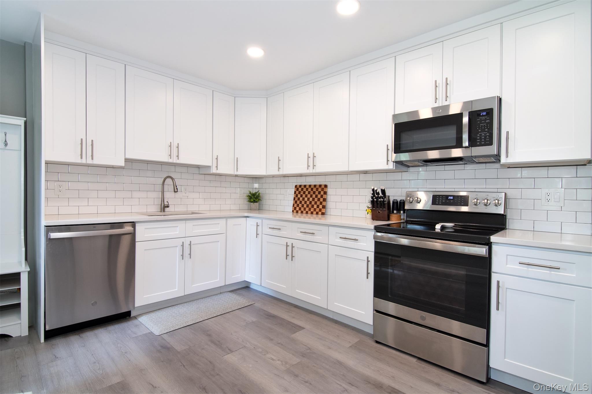 Spacious, fully-renovated unit in award-winning Irvington schools. Rare unit with private patio for grilling/relaxing. New kitchen with granite counters, subway tile backsplash, stainless steel appliances, deep stainless steel sink, soft-close cabinets/drawers. This unit has everything! Oak hardwood floors. Tastefully renovated bath. Private terrace with southern exposure. Free storage space, and parking for up to 2 cars, plus bike room and playground. Easy living: landlord provides heat, hot water, grounds keeping, snow removal. Steps from Aqueduct trail for walking/running/biking. 10 minute walk to quaint Irvington village, with destination restaurants and 2 waterfront parks. Metro North to Grand Central, easy commute, about 40 minutes during peak hours.