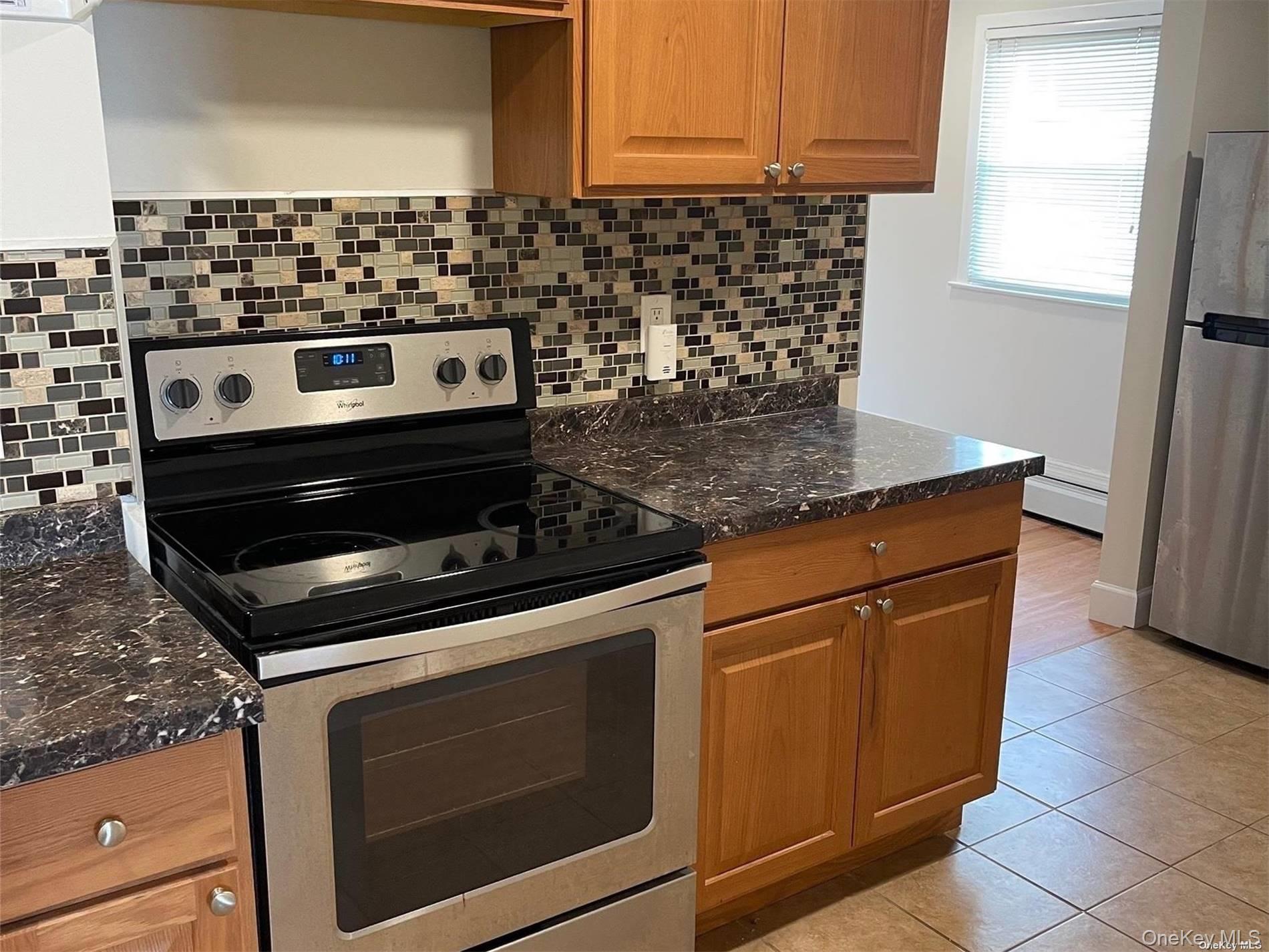 Nice 2 Bedroom 1 Bath apartment, rent includes Electric, Water and Heat. Live Right in the heart of Smithtown Village with all the Shopping & Restaurants close by!