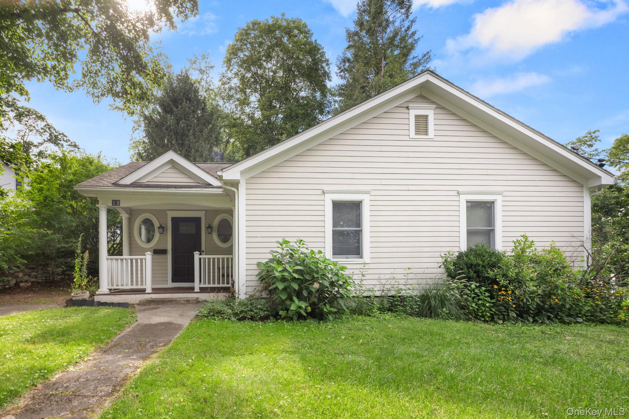?This charming cottage is within walking distance of the picturesque village of Pawling and on the market for the first time in over 35 years. Lovingly maintained and enhanced by its owner, this home boasts the ease and convenience of one level living. The renovated front porch welcomes you to the house while the beautiful sundrenched addition features heating, hardwood floor, oversized windows, and access to the deck and backyard, making it an ideal place to enjoy your morning coffee no matter the season. The space flows into the living room which captures all the charm of a 20th century home with its built-in shelving, hardwood floor and plaster walls. The kitchen&rsquo;s crisp white cabinetry, hardwood floor and pantry lead to the separate dining room with built-in countertop, cabinetry, hardwood floor and storage. This layout allows you to throw flawless dinner parties with your guests none the wiser about any untidiness in the kitchen. The two ample sized bedrooms are placed on opposite sides of the home offering privacy and quiet for everyone. The full bath was renovated to include task lighting, new vanity and a tiled tub/shower. Proceed outside to the trex like deck and continue beyond the house to a barn with loft and storage room. Adapt this space to meet any of your wants or needs - a workshop, a studio, a home gym or whatever suits you. This lovely home is located only 90 minutes to NYC, minutes to MetroNorth, highways, shopping, walking and biking trails and Lakeside park. The best part, being walking distance to the Village of Pawling affords you the opportunity to effortlessly engage in the village&rsquo;s shops, farmers&rsquo; market, restaurants and community events. A perfect location for commuters and remote workers, weekenders and year-round residents: anyone looking to partake in all the marvels of the Hudson Valley.