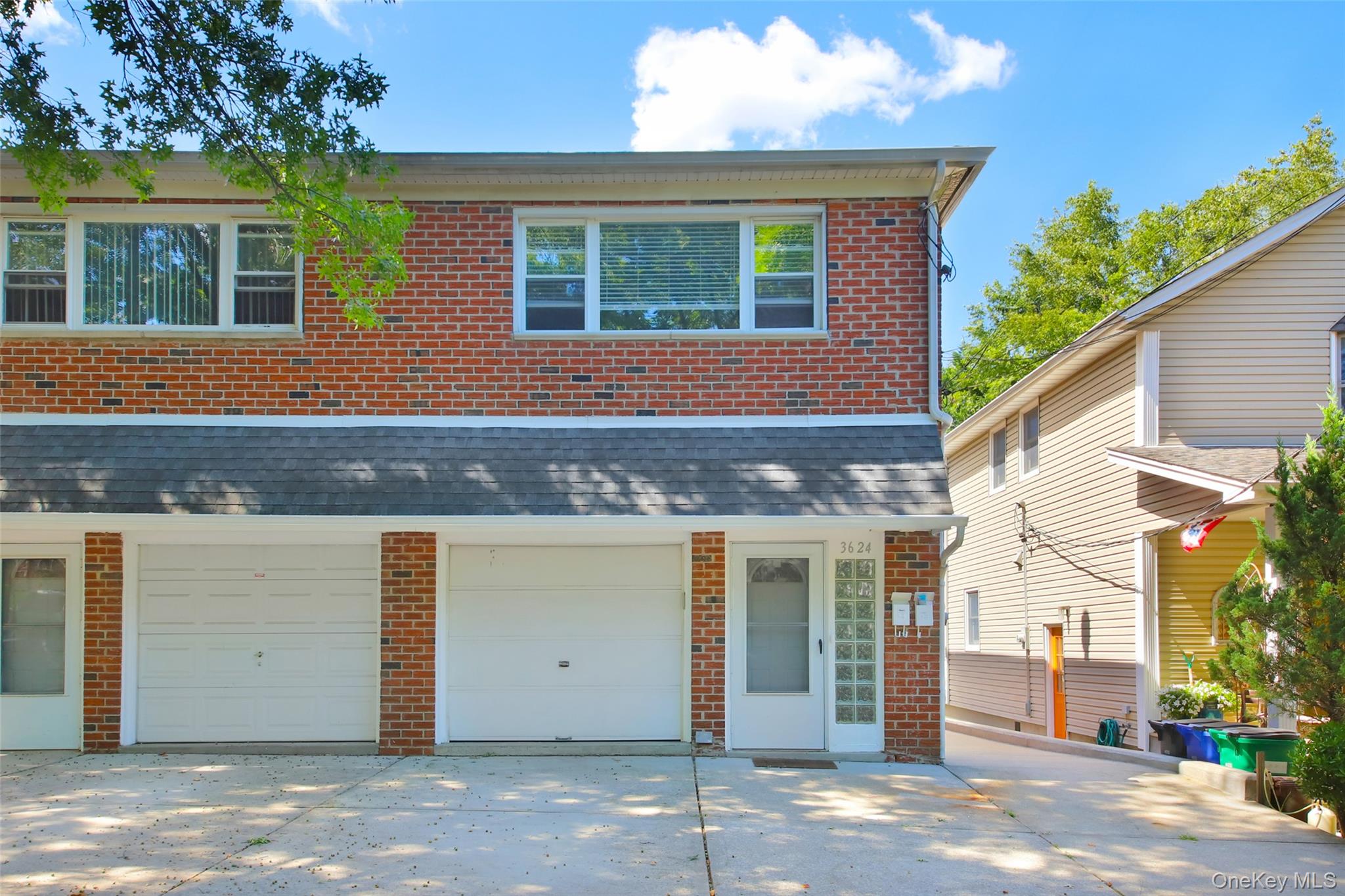 Welcome to this charming two-family semi-detached home located on a quiet, tree-lined block in Bayside. Offering comfort and flexibility, this residence is well-suited for both homeowners and investors.The first-floor unit features one bedroom and one bathroom, hardwood floors, a separate entrance, and oversized windows that fill the home with natural light to create a warm and inviting atmosphere.The second-floor apartment is stylish and contemporary, featuring a recently renovated kitchen with modern finishes and a dishwasher, a beautifully updated bathroom with modern details, two generous bedrooms, wall air conditioning, and an open, airy layout with large windows â€” perfect for comfortable living or generating rental income.The full finished basement provides abundant closets and ample storage, adding convenience and versatility to the property.Additional highlights include a spacious PVC-fenced backyard ideal for entertaining, gardening, or relaxing outdoors, a private garage, a new roof, and separate entrances for each unit to ensure privacy.Located just minutes from the Bayside LIRR station, this home offers a quick commute to Manhattan and easy access across Long Island. The neighborhood is also known for its community amenities, waterfront parks, shopping, dining, and convenient access to schools and transportation.Whether youâ€™re searching for a forever home or a smart investment, this rare Bayside opportunity offers comfort, convenience, and value all in one.