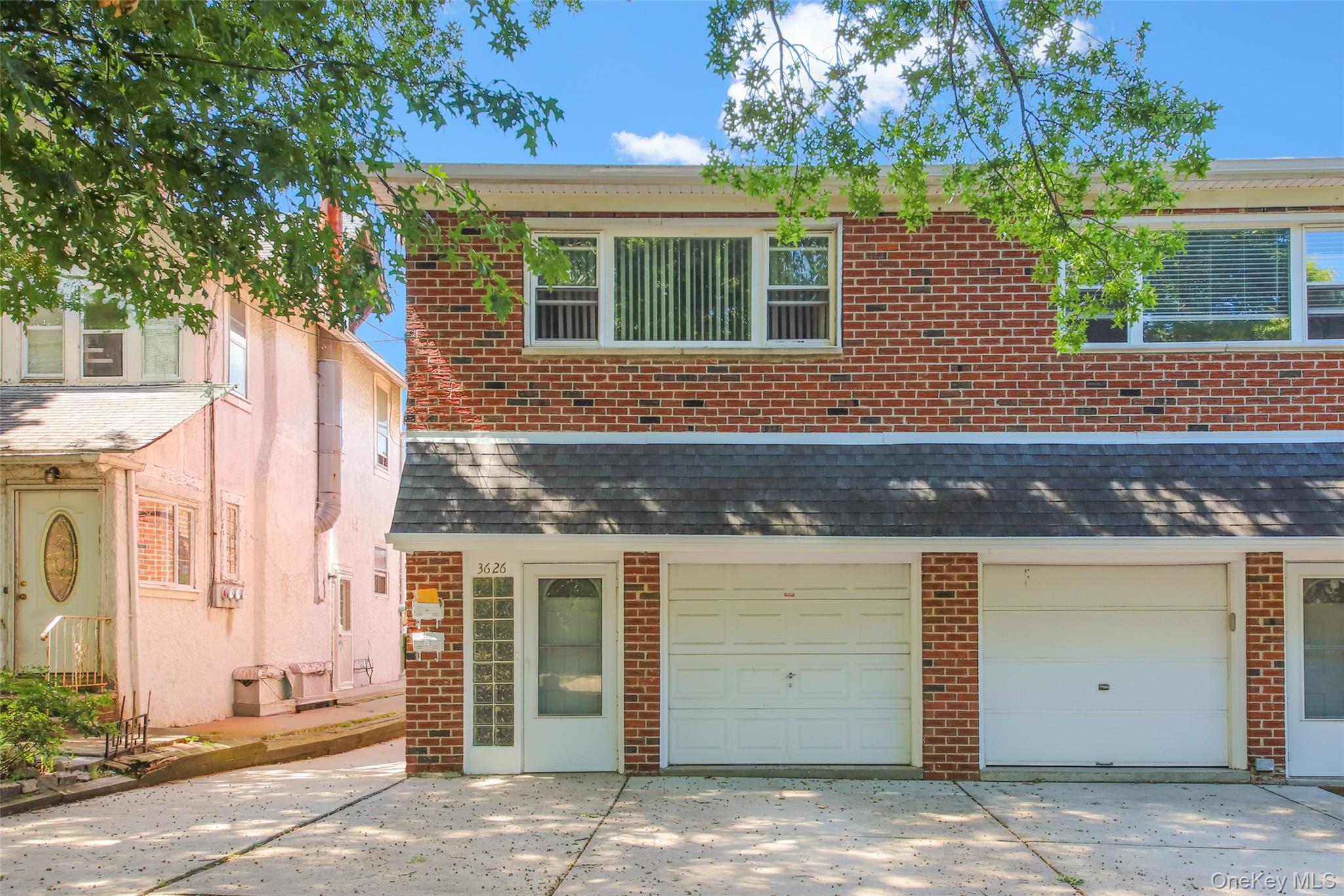 Welcome to this beautifully maintained two-family semi-detached home located on a quiet, tree-lined block in the heart of Bayside. This residence combines comfort, style, and functionality, making it an ideal choice for both homeowners and investors.The first-floor unit has been fully renovated with attention to detail, showcasing a sleek modern kitchen outfitted with stainless steel appliances, custom cabinetry, and contemporary finishes. A stylish bathroom, split-unit AC, and oversized windows that fill the home with natural light create a warm and inviting atmosphere.The second-floor apartment offers two generous bedrooms, a full bathroom, an eat-in kitchen, dishwasher, wall air conditioning, and an open, airy layout with large windows â€” perfect for comfortable living or rental income.The full finished basement provides abundant closets and ample storage, adding convenience and versatility to the home.Additional highlights include a spacious PVC-fenced backyard ideal for entertaining, gardening, or relaxing outdoors, a private garage, a new roof, and separate entrances for each unit to ensure privacy.Located just minutes from the Bayside LIRR station, this home offers a quick commute to Manhattan and easy access across Long Island. The neighborhood is also known for its community amenities, waterfront parks, shopping, dining, and convenient access to schools and transportation.Whether youâ€™re searching for a forever home or a smart investment, this rare Bayside opportunity offers comfort, convenience, and value all in one.