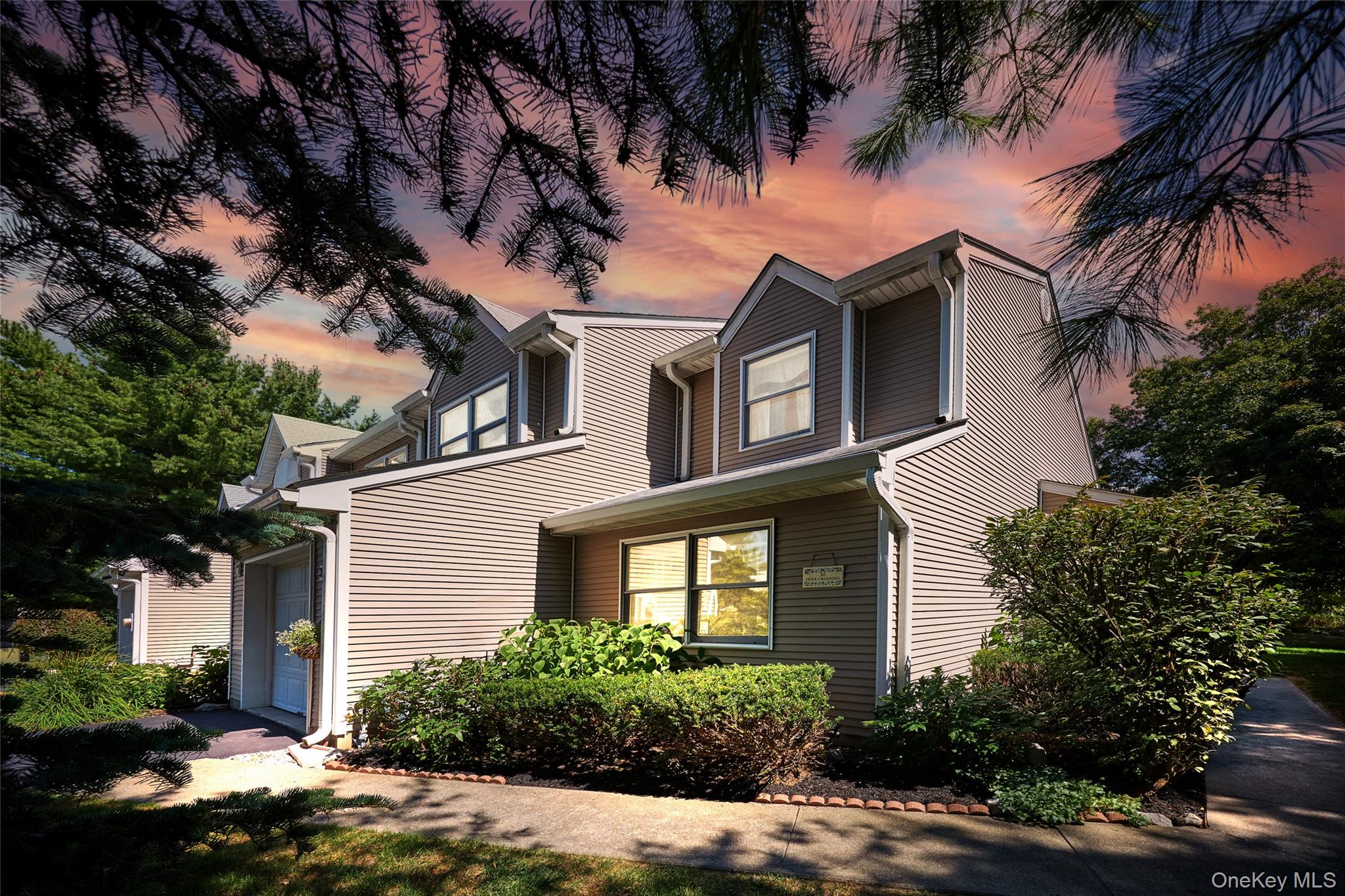 Welcome to this bright and spacious end-unit townhome, perfectly situated at the back of the Deer Crossing Community. Offering an ideal blend of comfort, style, and convenience, this home is move-in ready for its next owner. Step inside to soaring entryway ceilings and abundant natural light throughout the main level.The open-concept layout features a generous living room that seamlessly flows into the dining area, complete with sliding glass doors leading to a screened roomâ€”perfect for enjoying your morning coffee. The kitchen provides ample space for a table and chairs, and includes recessed lighting and new stainless steel appliances.The main level also offers a versatile bonus room, ideal as a guest bedroom, playroom, or home office, along with a full bathroom and a convenient laundry closet with washer and dryer.Upstairs, youâ€™ll find a bright and open loft with a skylightâ€”perfect for a cozy reading nook, media lounge, or work-from-home space. An adjacent walk-in storage area provides plenty of room for seasonal items. The expansive primary suite includes a walk-in closet and a full bathroom.Additional highlights include natural gas, municipal water and sewer, a spacious driveway, an attached one-car garage, and guest parking. Enjoy the communityâ€™s in-ground swimming pool and clubhouse, just steps from your front doorâ€”all with low HOA fees.Conveniently located off Route 52 in Fishkill, this home offers easy access to schools, the Taconic State Parkway, I-84, Route 9, and Metro-North train stationsâ€”making for an effortless commute and providing plenty of nearby shopping, dining, and entertainment options.Donâ€™t miss your chance to own this beautiful townhome in a prime location!
