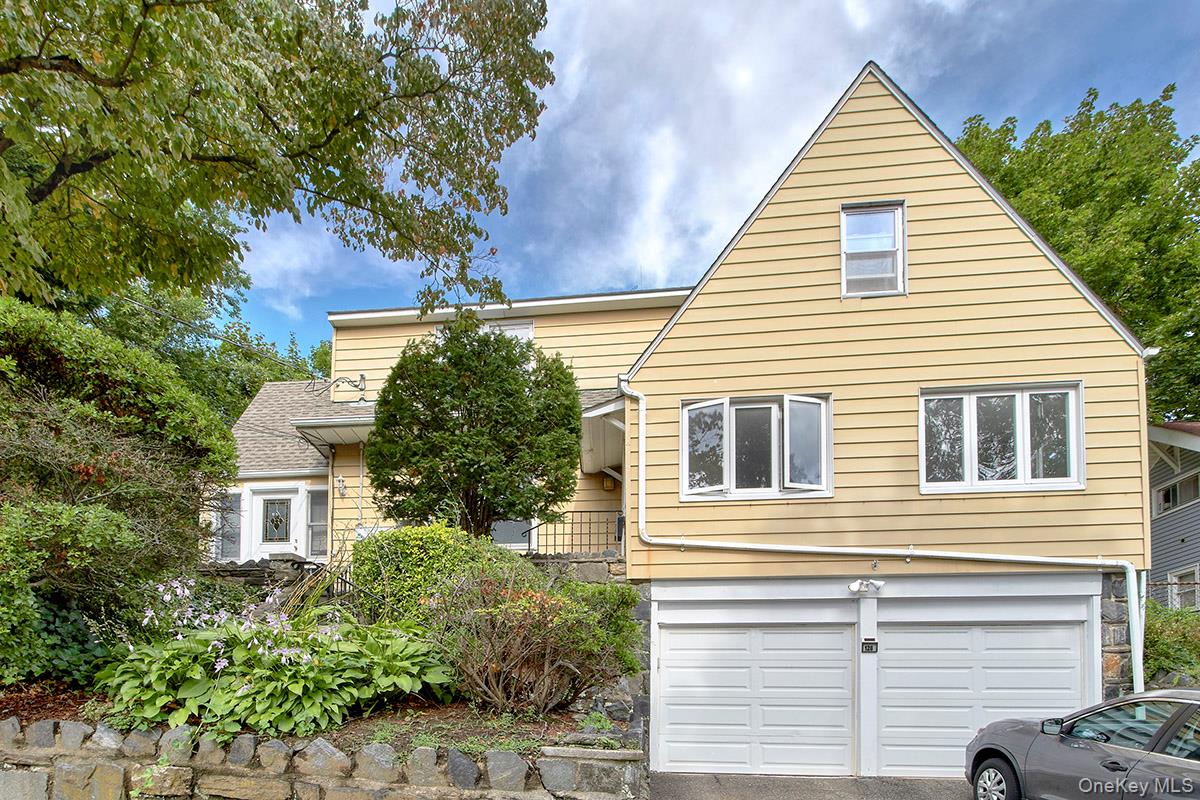 Beautiful newly renovated townhouse style apartment in walking distance to White Plains train station and downtown area. Large and spacious rooms, hardwood floors, living room, formal dining room, new kitchen, updated powder room, door out to private patio. Master bedroom with office/nursery area, 2 bedrooms, updated hall bath, lots of storage space throughout, washer/dryer. 1 car garage parking with 2 additional driveway spots, heat and hot water included, use of patio and yard, feels like your own home! Additional Information: HeatingFuel:Oil Above Ground, LeaseTerm: Over 12 Months