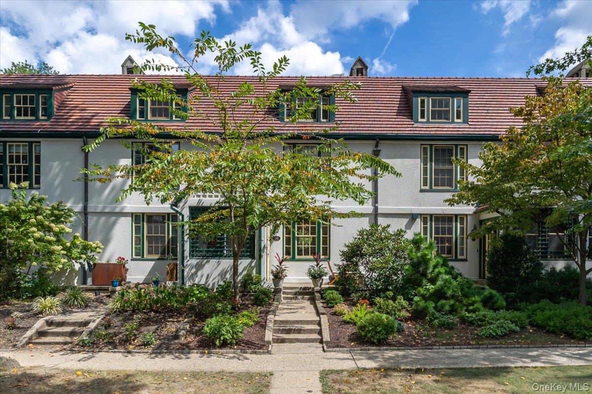 Own a Piece of History and Tradition in Forest Hills Gardens. Step into timeless elegance with this historic residence located in the prestigious and private gated community of Forest Hills Gardens, a masterpiece of urban planning designed in the early 1900s by renowned architect Grosvenor Atterbury. This exclusive 175-acre enclave is celebrated for its tree-lined streets, private gardens, and architectural charm; offering a unique blend of historic character and modern convenience. The home welcomes you with a bright living room overlooking tree-lined landscapes, flowing into a dining area and a chefâ€™s kitchen featuring custom cabinetry, quartz countertops, stainless steel appliances, and direct access to a private outdoor patio. Upstairs, the second floor offers two generously sized bedrooms with a beautifully updated full bath and split system air conditioning and heating, while the third floor provides two additional bedrooms with serene, park-like views. The newly renovated basement includes a full bathroom, washer and dryer, abundant storage, and flexible space to suit your lifestyle. Just moments from the Forest Hills LIRR station, youâ€™ll enjoy seamless access to all your needs while living in a peaceful and storybook setting.