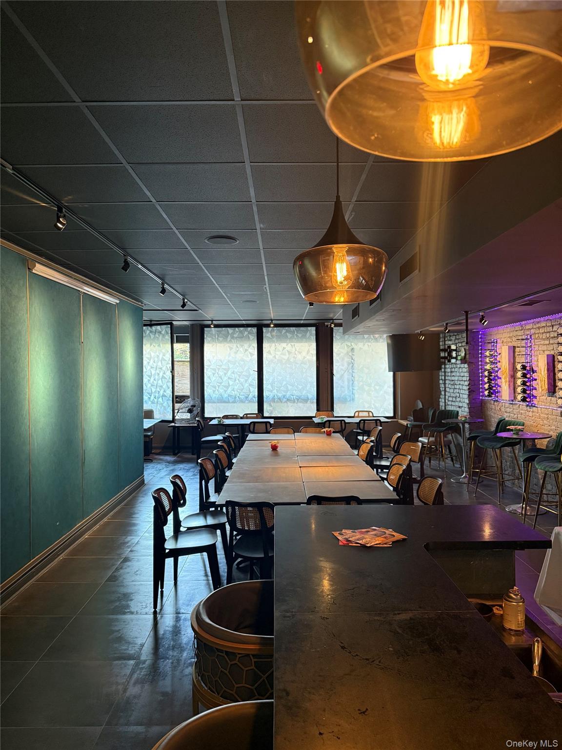 A beautifully designed, fully built-out restaurant space is now available, featuring a modern dining atmosphere with sleek finishes and versatile seating arrangements. The spacious layout includes both private and group dining areas, enhanced by custom lighting and stylish details that create a welcoming yet upscale environment.The property is equipped with a full commercial kitchen, professional-grade equipment, ample prep areas, storage rooms, and walk-in refrigeration, making it ready for immediate operation. A bar/lounge section adds flexibility for beverage service or casual dining. Additionally, a residential apartment with two bedrooms and two bathrooms is included, providing convenient on-site accommodations.This versatile space is ideal for a wide range of dining concepts â€” from fine dining and casual family-style service to bar-focused concepts, seafood, steakhouse, or dessert cafÃ©. With its thoughtful design, complete kitchen build-out, and inviting atmosphere, this property presents an outstanding turnkey opportunity for experienced operators.