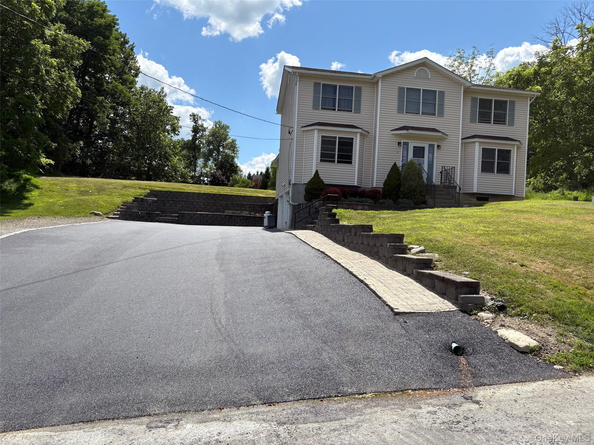 This beautiful, well-kept colonial home is located in the desirable lake region of Monroe, and is close to two large lakes where you can feel like your on vacation every day. Fishing, swimming and canoeing are just some of the fun water sports you can enjoy. This center hall colonial features 4 bedrooms, a dedicated study, and 2.5 updated bathrooms. The interior has been recently painted, in a neutral color giving it a fresh and inviting feel. The property sits on a large, level lot with a huge backyard, perfect for outdoor activities and entertaining. Some Recent upgrades include new underground drainage around the entire foundation of the house and a new, oversized blacktopped driveway. Conveniently located, this home offers easy access to local schools, shopping centers, and major highways. Commuters will appreciate the proximity to public transportation to New York City The award winning Monroe Woodbury schools are nearby and offer numerous programs and activities for students  The neighborhood is known for its friendly atmosphere, and with Halloween approaching, you&rsquo;ll be ready to join in the fun and start trick-or-treating in your new community.