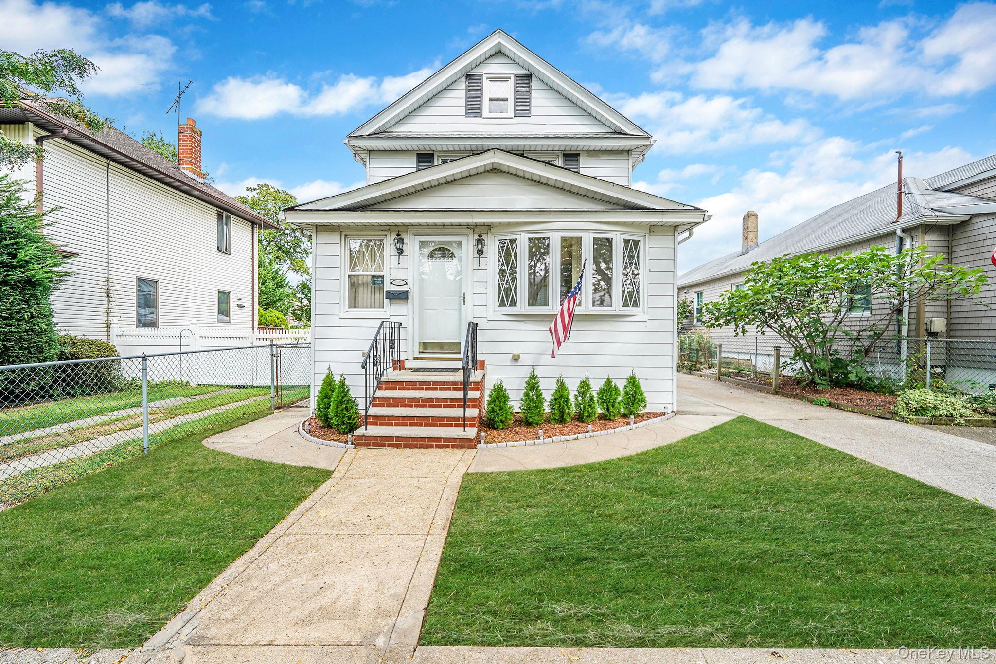 This three-bedroom, two-bath Colonial on the Queens side of Floral Park has been carefully maintained and thoughtfully updated. The foyer and kitchen feature radiant heat, with the kitchen also offering quartz countertops that pair practicality with understated style.The home follows a classic Colonial layout with generous living and dining spaces, three comfortable bedrooms, and two full baths. A fully insulated attic provides efficient storage, while a side door offers convenient access to the basement.Low property taxes, currently reflective of the Enhanced STAR program and Senior Exemptions, make this an appealing opportunity to own in a sought-after neighborhood.