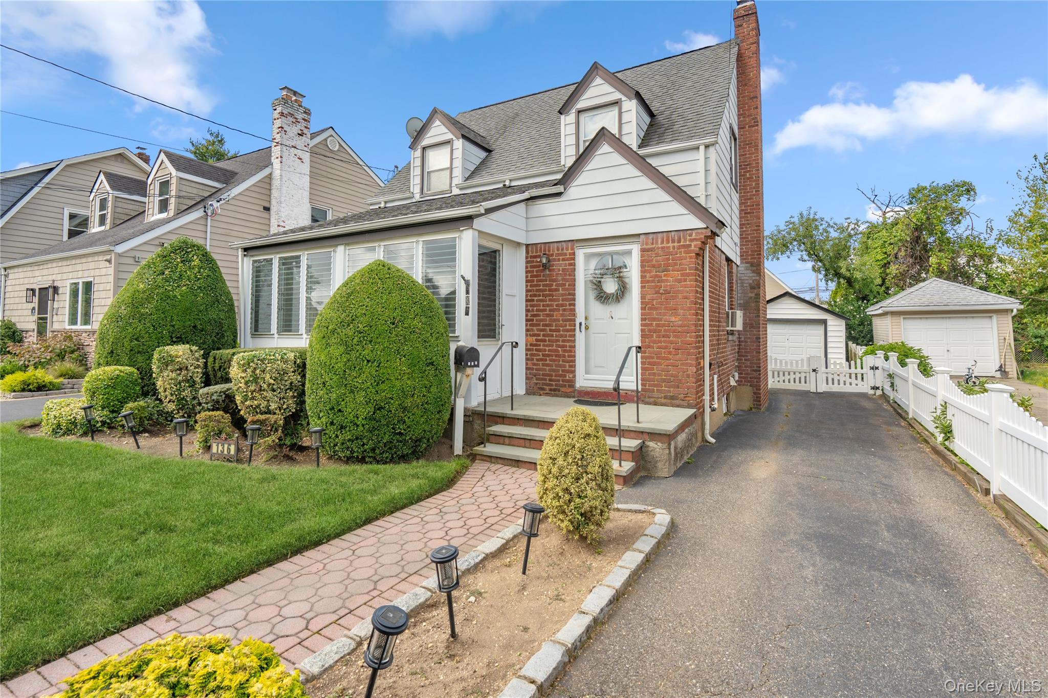 Charming cape cod in the heart of franklin Square.  Living room with fireplace, first floor bedroom or office, nice sized front enclosed porch could be used as a 3 seasons room, kitchen with cozy bright dining area, Upstairs boasts 2 nice sized bedrooms with an updated bath. Hardwood floors under the carpeting in most of the house. Updated gas heat installed in April of 2025 and gas cooking This home is close to almost everything, Rath park with ball fields and community pool, public transportation on Hempstead Turnpike and Polk street elementary school.