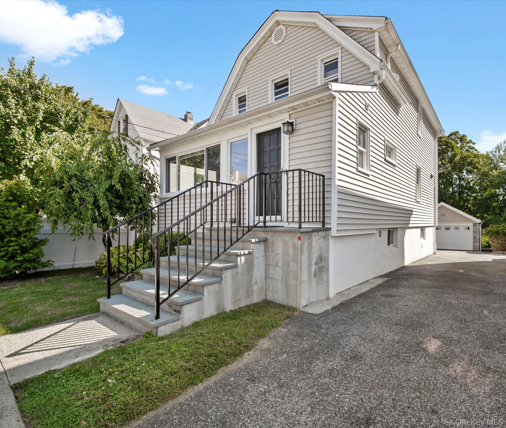 Move-in ready and tucked away on a quiet one-way street in the sought-after Chatsworth Avenue School district, this charming 3-bedroom, 2.5-bath Colonial offers the perfect blend of character, modern updates, and convenience. The open-concept kitchen with recessed lighting, high ceilings, and a stunning gas fireplace flows into sun-filled living spaces with hardwood floors throughout. Recent upgrades include energy-efficient Okna windows and a fresh coat of paint. Additional features include a beautiful sunroom, spacious deck, and a 2-car garage with storage. With low taxes, no flood zone concerns, and no Thruway or railroad noise, this is a rare Larchmont findâ€”just minutes from Manor Beach and the rights to use it, the Long Island Sound, Pryer Manor Marsh & Preserve, local shops, and all three Mamaroneck schools: elementary, middle, and high school.