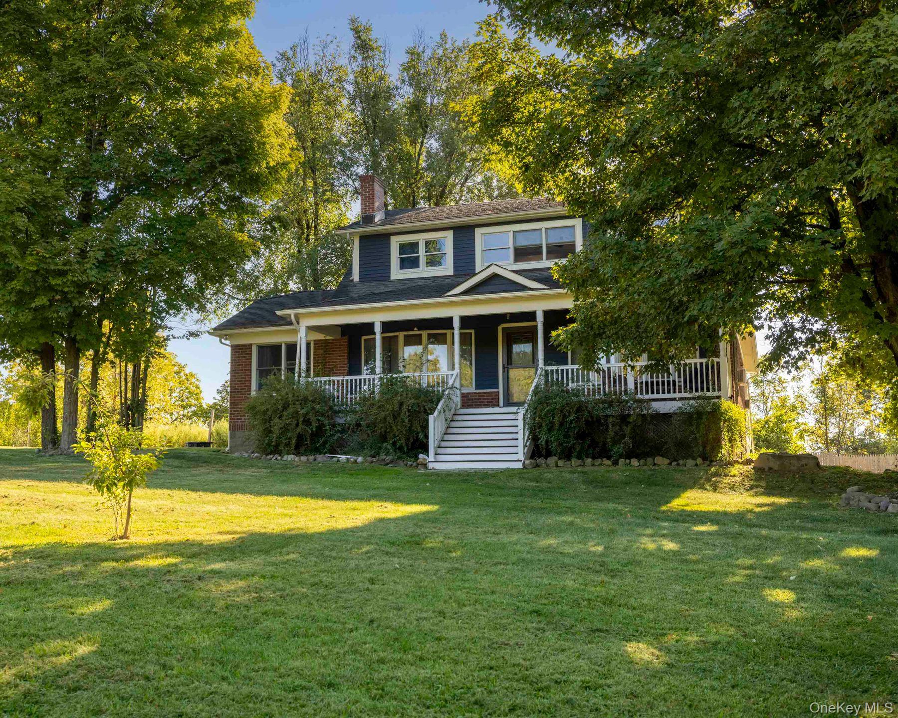 This charming 1900 farmhouse in Highland, New York, offers a comfortable and spacious living space with original wide custom moldings and beautiful oak hardwood flooring. Enjoy the beautiful sunlight in the fully finished sunroom. The kitchen is open with plenty of counter space and new appliances. Large dining area. The primary bedroom is on the first floor with windows facing three sides. enjoy quiet evenings in the cozy living room complete with fireplace. Exterior freshly painted. Two private bedrooms on the second floor. The front porch is covered with beautiful mountain views. Separate 2 car garage is currently set up for one car and workspace. This home is beautifully set on almost an acre with the upstate country feel you are looking for. You will be pleasantly surprised all spring and summer by beautiful perennials. All this plus close to Metro North or the NYS Thruway for easy commuting. Area attractions are all within a few miles.