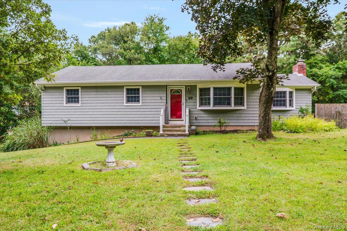 Welcome to this well-maintained 3-bedroom, 1-bath ranch set on a private and secluded 0.43-acre lot that backs up to town-owned land, offering peace and privacy. The home features a bright living room with a bay window and a spacious family room/den with vaulted ceiling, wood-burning fireplace, oak floors, and two large bay windows that bring in natural light. The large kitchen offers extensive cabinetry, granite countertops, stainless steel appliances, and propane gas cooking, with a separate dining area that opens to the backyard through sliding glass doors. The full bath features both a sunken tub and a separate shower. Step out into your private rear yard with a two-tier Trex deck, ideal for entertaining or relaxing outdoors. Additional features include a whole-house Puronics water filtration and softener system, 200 amp electric with generator transfer switch, alarm system, gutter guards, cedar impression vinyl siding, and a newly paved driveway (approx. five years old). The full unfinished basement offers storage and utility space with access through the two-car attached garage. Washer and dryer are approximately eight years old. A truly inviting property offering comfort and privacy. This is truly a must see and one you don&rsquo;t want to miss!