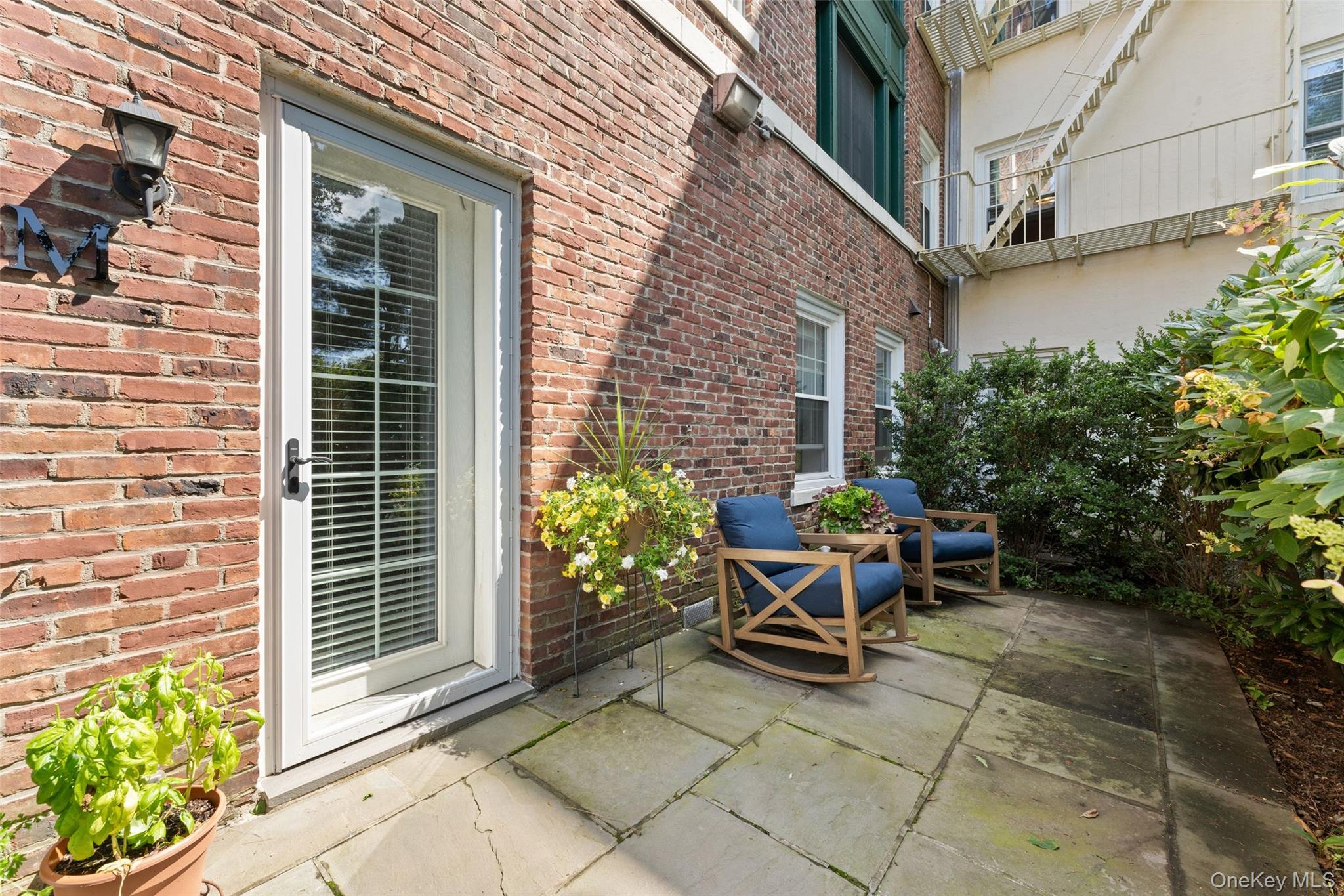 Step into this delightful garden-level 2-bedroom, 2-bath apartment at Brooklands, a beautiful 1927 Georgian-style complex recognized for its elegant architecture and beautifully landscaped grounds. Inside, you will find an updated dine-in kitchen, a smashing living room with space to relax or entertain, and a private garden-level patio with its own entrance. This cooperative apartments blends the character of pre-war design with the ease of modern updates, offering comfort and style. The garden-level layout provides easy access and a private entrance, while unassigned parking ensures convenience for residents. Just outside your door, a quick stroll takes you to the heart of Bronxville Village with its boutiques, restaurants, Metro North station, Saturday Farmersâ€™ Market, and nearby parks and trails. With major parkways minutes away, commuting is effortless. Donâ€™t miss the opportunity to own this Brooklands residenceâ€”where lifestyle, and location come together in one extraordinary package.