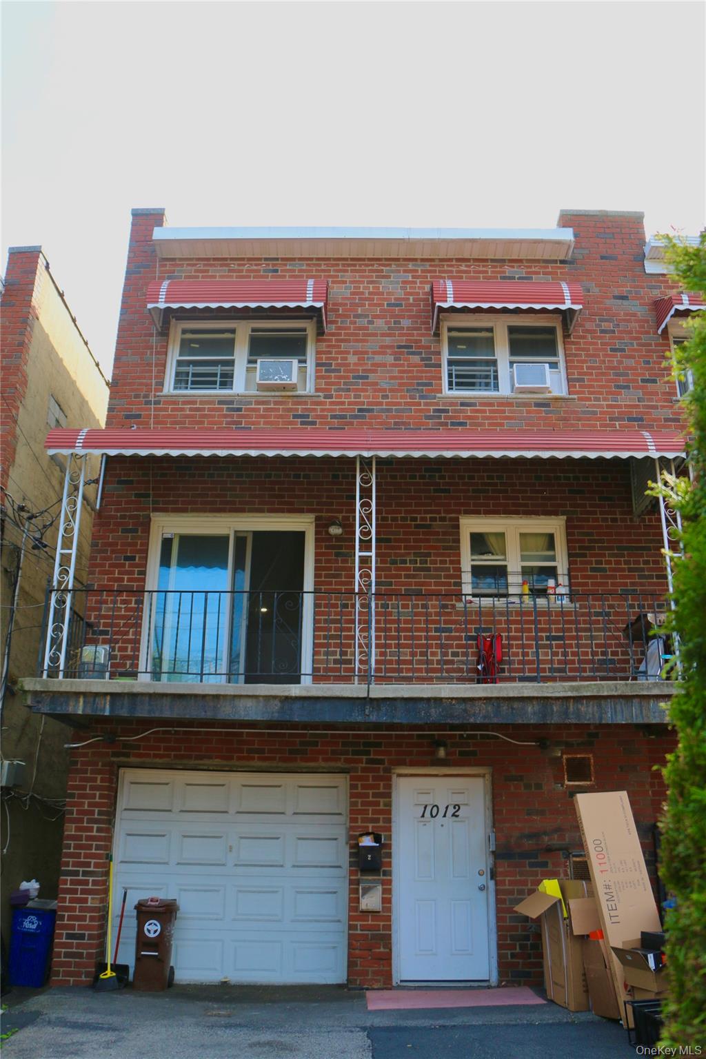 (INTERIOR PHOTOS COMING SOON)Welcome to 1012 E 233rd Street, a legal three-family property located in the heart of Wakefield, Bronx. This home offers the perfect balance of immediate rental income and long-term potential, making it an excellent choice for both investors and end-users. Inside, youâ€™ll find upgraded units with hardwood floors and expansive layouts. The first floor includes two bedrooms, one bath, and living area. The second floor features three bedrooms, one bath, bright and airy living spaces, and a private balcony ideal for enjoying quiet mornings or evenings. The third floor also provides three bedrooms and one bath with plenty of natural light and open layouts. All units are currently tenant-occupied on a month-to-month basis, providing built-in income from day one, though the property can also be delivered vacant, giving buyers flexibility to occupy or reconfigure as needed. Additional highlights include a private driveway and one-car garage, a rare convenience in this area. The location is unbeatable, with close proximity to public transit, schools, and shopping, ensuring strong rental demand and long-term value. This is a rare opportunity to secure a versatile multi-family residence in a prime Bronx location. Whether youâ€™re expanding your investment portfolio or seeking a multi-generational home with income potential, 1012 E 233rd Street delivers.