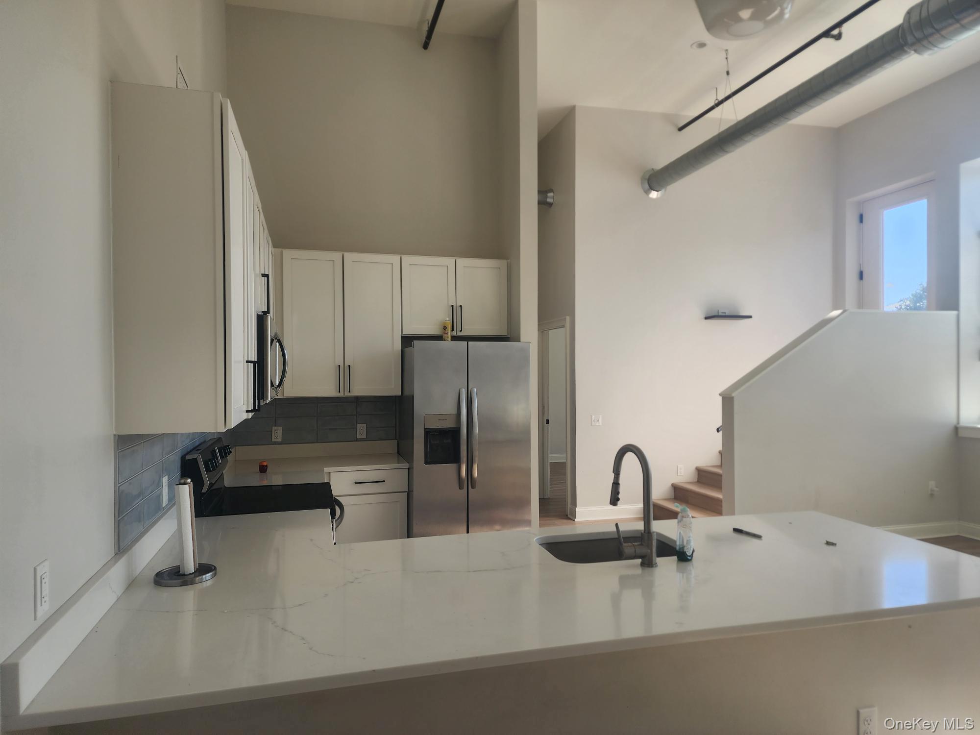 Welcome to The Arlington. This is the largest unit on site and it is fully available for someone to call it home. This unit is the only one in the complex with its own deck off the back of the unit. With over 1200 sq feet of living space. this unit is perfect for someone looking to get a generously sized apartment close to the Arlington business district. All units feature keyless locks, washer and dryer in unit, with central heat and A/C. Complex has amenities such as clubhouse, fitness center and game room.