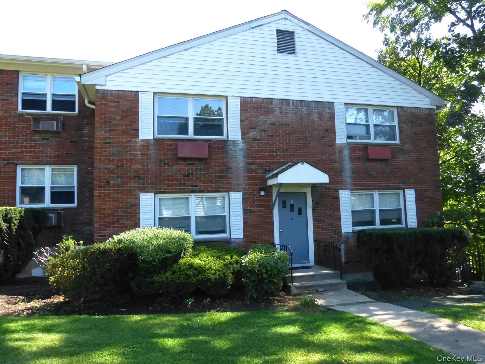 Great opportunity to live in the sought after Village of Nyack. First floor, oversized studio apartment with very large living room/bedroom, separate dining area, full kitchen with new refrigerator and dishwasher and full bathroom. Beautiful hardwood floors throughout. End unit with lots of light. Updated windows. Plenty of closets. Freshly painted. Assigned parking space. Rent includes heat, water, free laundry (in basement). Walk to town for shopping and dining. Great commuter location. Cats ok. NO DOGS