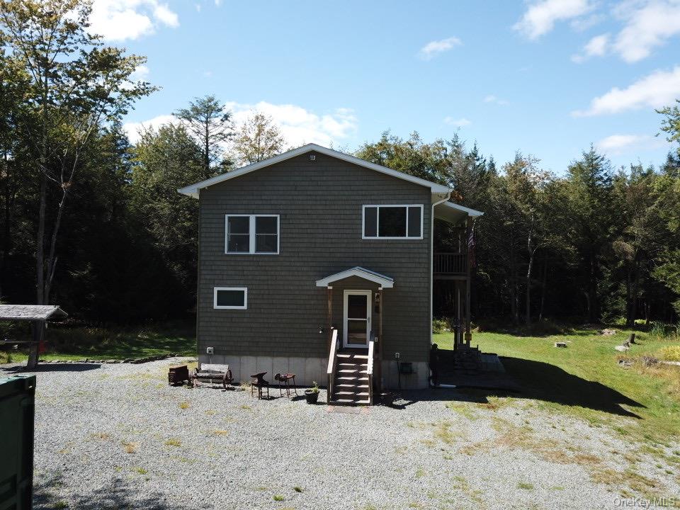 Charming Two-Story Home Near Livingston Manor â€“ Parksville, NYWelcome to this inviting two-story home nestled in the scenic Catskills, just minutes from Livingston Manor. Featuring 3 spacious bedrooms and 1.5 bathrooms, this well-maintained property offers a comfortable layout perfect for full-time living or a weekend getaway.Step into a bright and airy living room and kitchen with tall ceilings that create a sense of openness and warmth. Enjoy your morning coffee or evening sunset on the private balcony, or relax outside in the peaceful natural surroundings.Additional highlights include a whole-house generator for peace of mind, and a versatile outbuildingâ€”ideal for storage, a workshop, or creative space.Conveniently located near the charming shops, restaurants, and outdoor attractions of Livingston Manor, this home is a perfect blend of country living and modern convenience.Donâ€™t miss this opportunity to own a piece of the Catskills!
