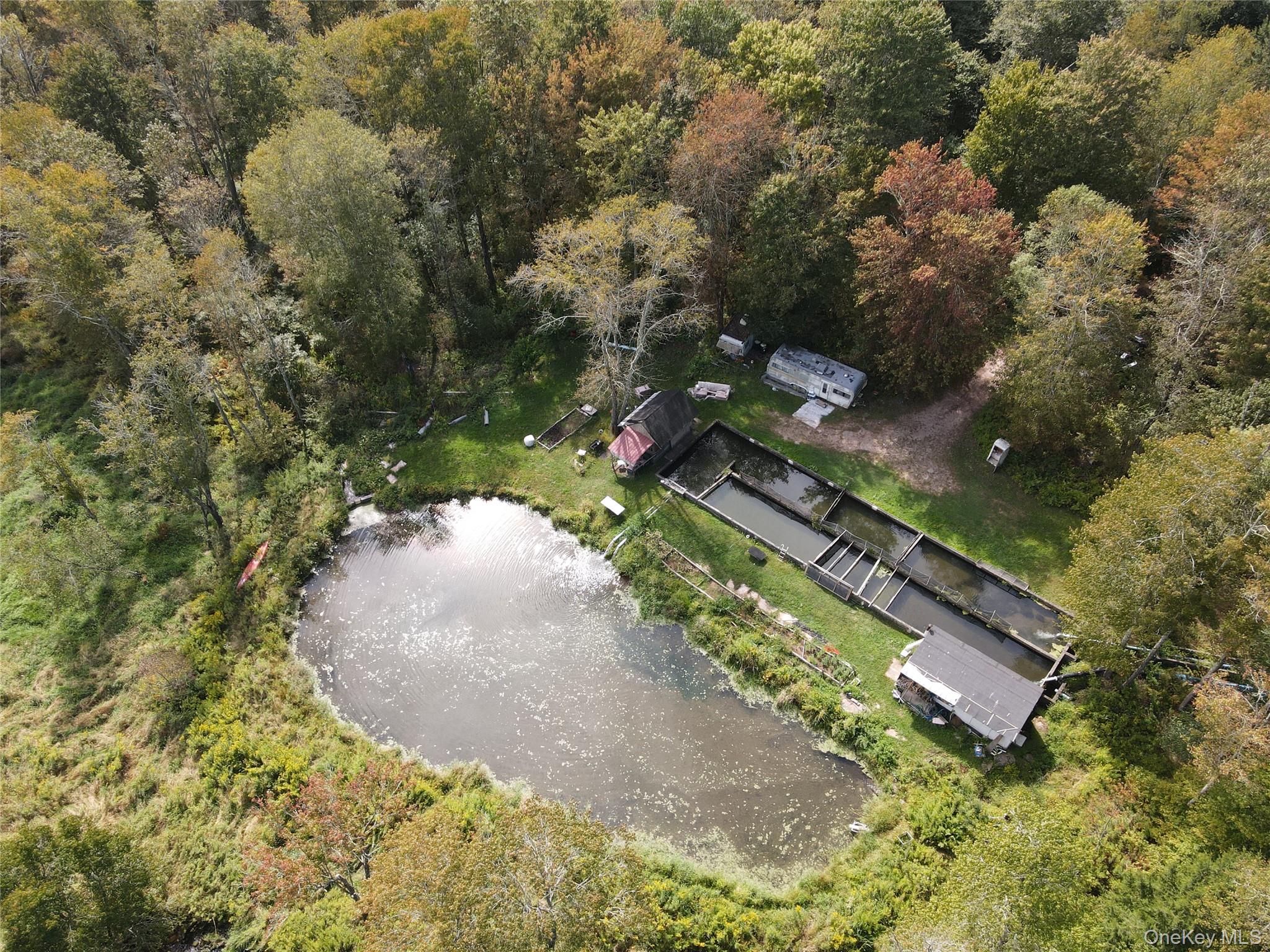 Over the hills and through the woods to the established fish hatchery, we go! Two large concrete pools, a small building for hatching eggs, and another storage building to keep your supplies, oh, and we can&rsquo;t wait to mention the additional 13.5 acres of prime land located just off of Route 17 with a pond and a brook that feeds the hatchery. This is a rare opportunity to purchase a business like this with a license to raise and sell fishâ€”it comes with the fish, including rainbow trout, brook trout, and steelheads. This unique property could easily be reimagined for agriculture, food production, light industrial use, recreation, or other commercial enterprises. With direct access to major highways and proximity to Liberty, this site provides convenience and opportunity in a rapidly growing corridor of Sullivan County. Zoned ICWhether youâ€™re looking to continue the aquaculture tradition or bring a new vision to life, this property offers the space, access, and flexibility to make it happen.