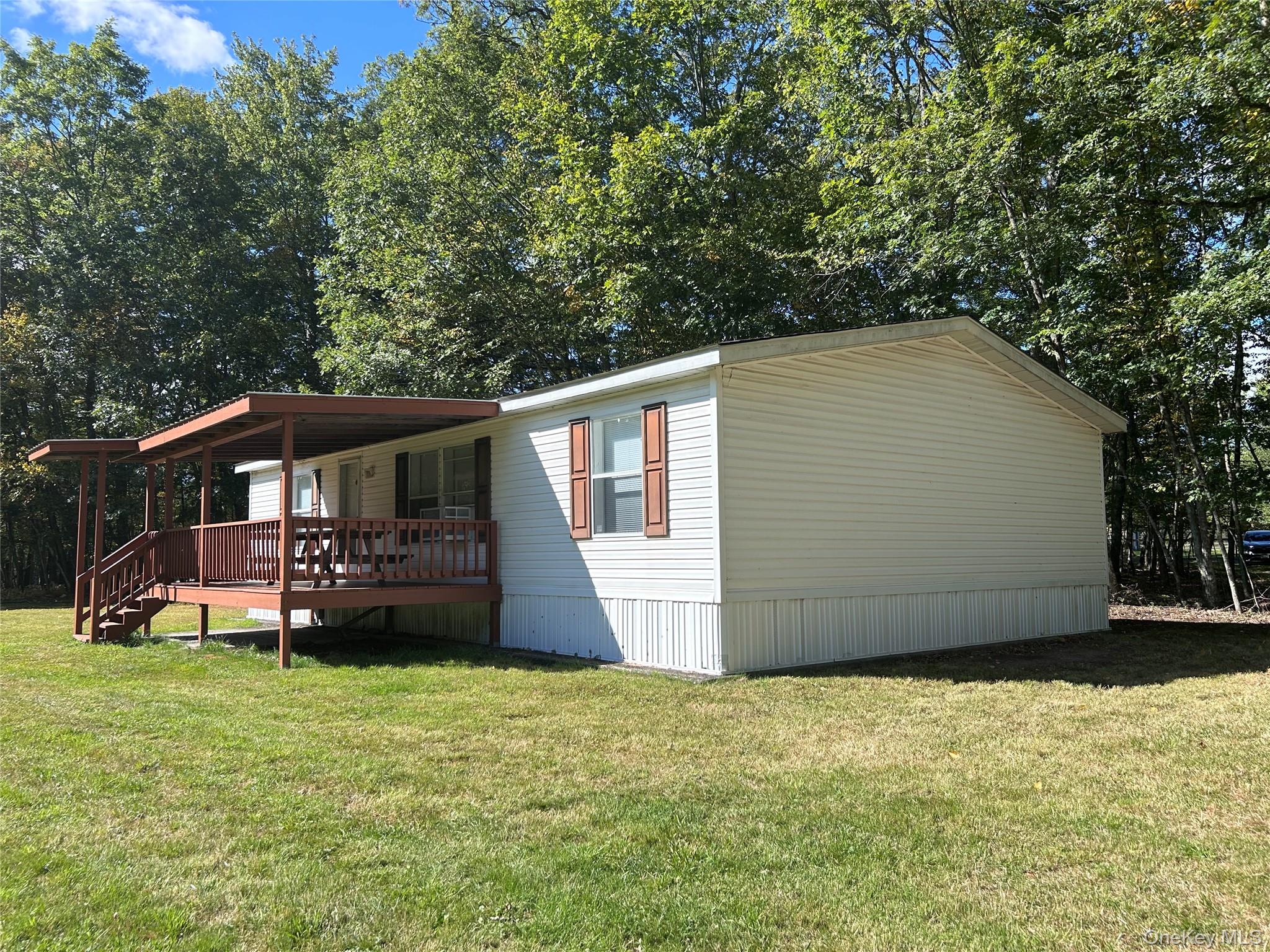 Here&rsquo;s a family&rsquo;s long time get-away from NYC in a convenient, private location with a lovely pond and a couple of miles from the Cochecton public access to the Delaware River. The home is in excellent condition. A shady covered deck extends on the front overlooking the yard and the sweet pond at the edge of the meadow. There is a 2 car detached garage for toys or cars. A 1973 structure, no longer in use, is awaiting rehab or tear down. Seller will give buyer a $10k credit at closing towards that cost. Property started out as a 30.74 ac property. 20.5 ac were sold and 10.23+/- remain. Great location for full time residence or to enjoy on weekends. Come and take a look.