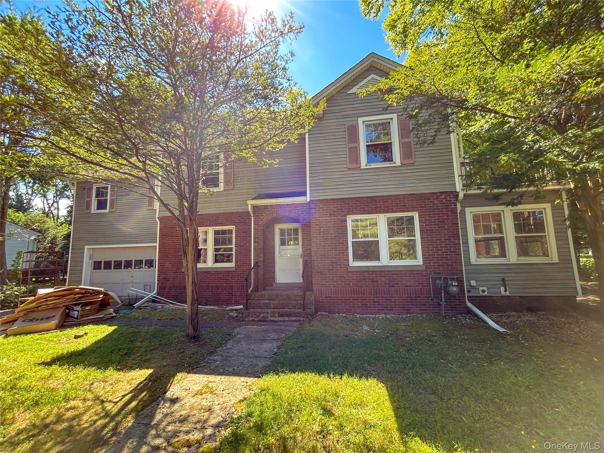 This spacious 5-bedroom, 2.5-bath home is a must-see! This classic colonial home offers loads of original charm and character, with spacious rooms and a open, inviting floor plan. The 1st floor features a welcoming foyer, eat-in kitchen, formal dining room, living room, study, and a half bath. Upstairs, you&rsquo;ll find 5 bedrooms, including a large primary with a full bath and balcony, and an additional hall bath. There&rsquo;s a huge walk-up attic with lots of storage space. The full unfinished basement has the utilities, washer/dryer hook-ups, and barndoor style walkout. Outside you&rsquo;ll find a 2-car attached garage, and a back-up gas generator for peace of mind. All major systems are operational, and with some vision and renovation you can restore this home to it&rsquo;s former glory.
