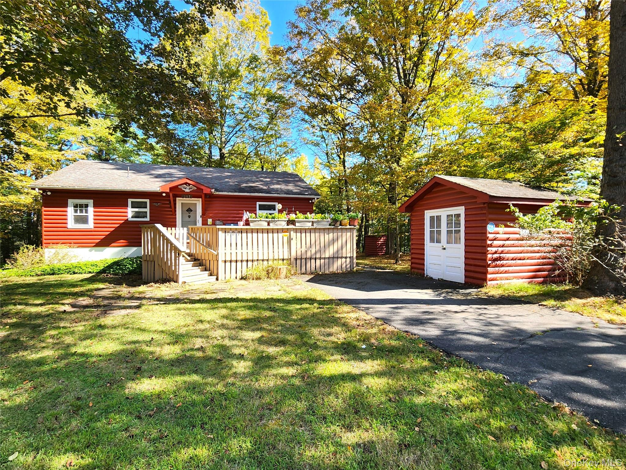 Private Smallwood Oasis! This three bedroom, one full and one 1/2 bath home is year round, move-in-ready and in mint condition. Set perfectly back off the road. The property goes 200 feet from East Thompson to East Tusten. Plenty of room to spread out with family and friends. Living space is all on one level and checks a lot of boxes. Central AC, forced warm air heat, hardwood floors, knotty pine walls, wood-burning fireplace, high ceilings, high speed internet, double oven, gas cooktop, dishwasher, new refrigerator, generous cabinet and closet space, sizable sun deck and shed for garden tools and lawn furniture. Large unfinished basement with washer/dryer, oil tank, HWH, holding tank, more storage and walk out door. Rare for Smallwood, this 1.03 acres of park-like property is astonishing. So beautiful and satisfying to gaze in any direction. The possibilities are endless. Imagine the gardens, yard games, watching the stars, gathering around a firepit, adding a pool, a hot tub and hanging out in the hammocks! No HOA...Smallwood offers membership for non-motor boat lake, sandy beach, fishing, sports court and clubhouse. Join the Club at Smallwood for heated pool, clubhouse with activities and entertainment. Nearby Bethel Woods, Resorts World Casino, Kartrite Waterpark, waterfront dining, festivals, farmer&rsquo;s markets, antique shops, waterfall, dog park, and the Forest Reserve for hiking and outdoor exercising. In Sullivan County there is so much to explore with an abundance of mountains, lakes and rivers. Call to take the tour.