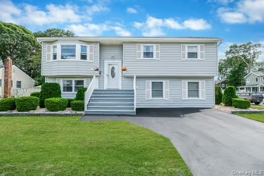 Home sweet home !! This 6 bedroom 2.5 bath legal mother daughter is in a prime location in Ronkonkoma. This corner lot has no outlet and is peaceful and serene, the backyard is flat and sprinklered and well maintained. Not only will all the appliances be gifted but also lawn equipment included. Seller motivated and will be delivered vacant.