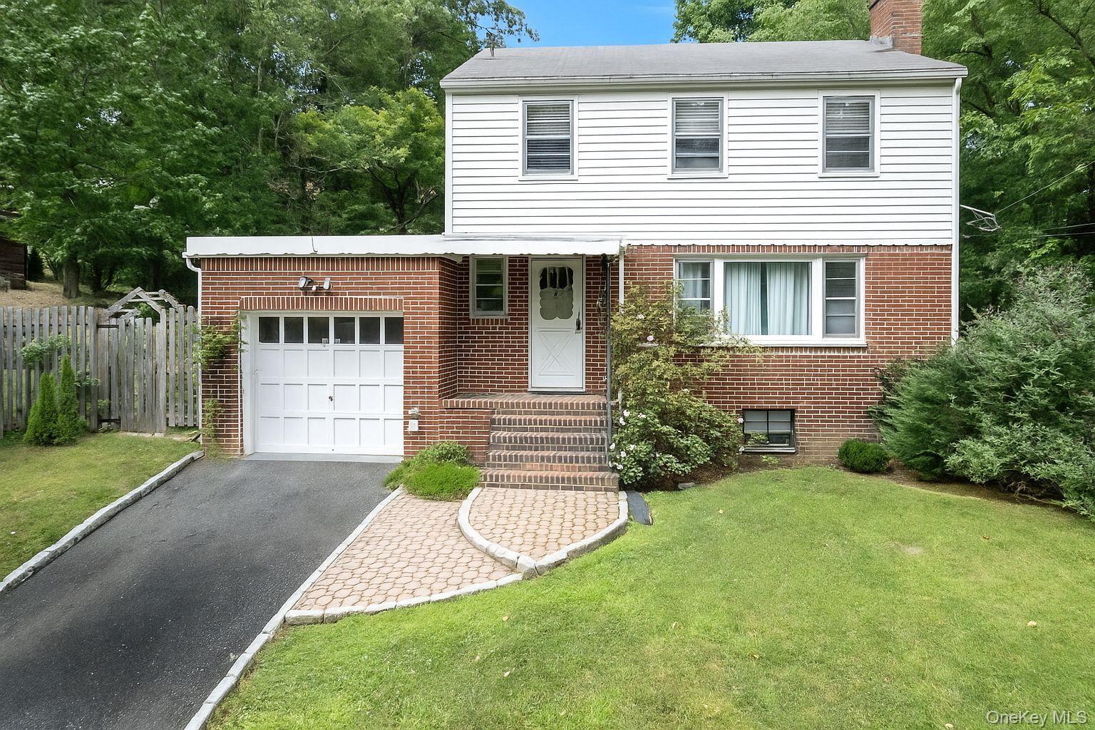 Freshly painted and move in ready! A place to call home. A rare rental that accepts pets. This three bedroom, one and a half bath Colonial in Hastings on Hudson with wood floor though out, wood burning fireplace, a level backyard, one car garage and plenty of room in the heated, spacious basement for storage or additional work from home needs. All this with in walking distance to schools, shopping, dining, Metro North to Grand Central and nature trails.