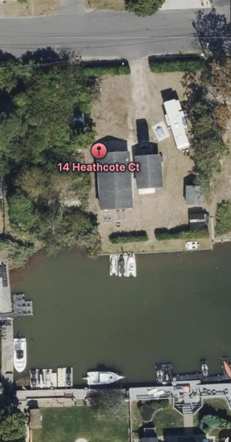 Location, Location, LocationWaterfront gem for sale.To all builders & investors. The potential in this double lot property with 140ft on canal is limitless. A mere few minute walk to Smith Point Beach. Create your dream home with this renovation ready property. House structure includes 800 sq ft with detached garage.